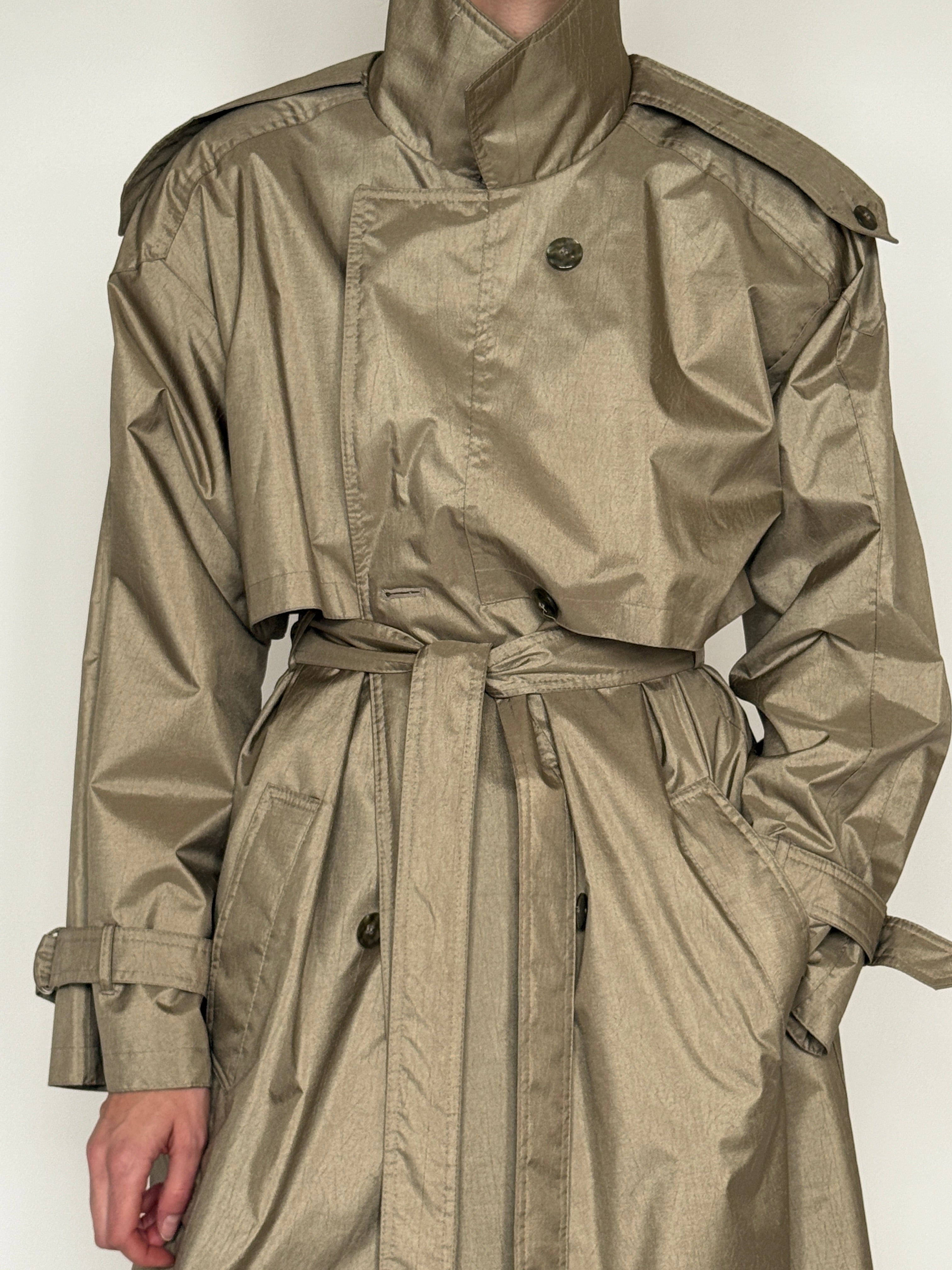 Vintage metallic taupe trench coat pocket detail