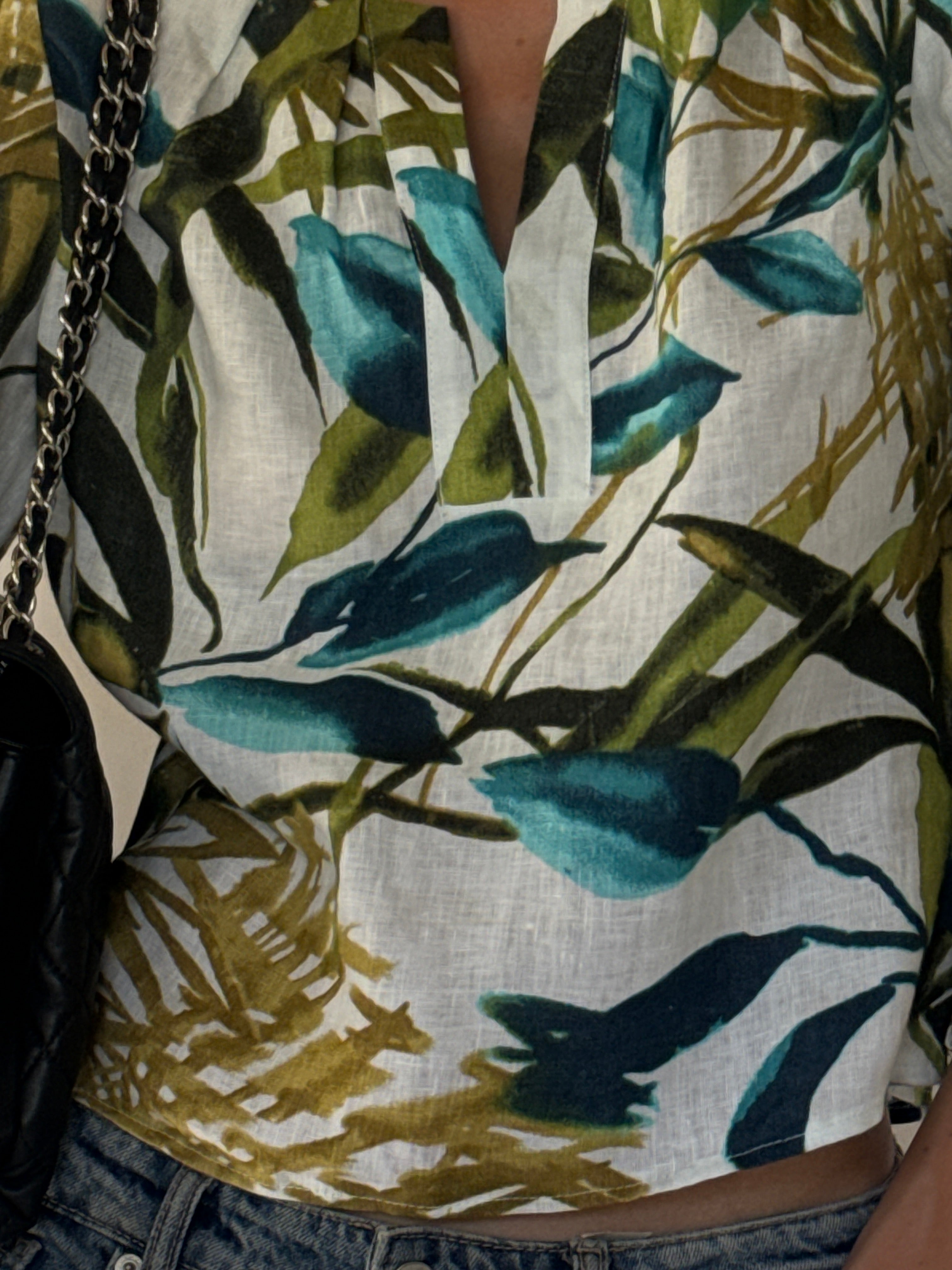 Vintage tropical leaf print fabric close-up