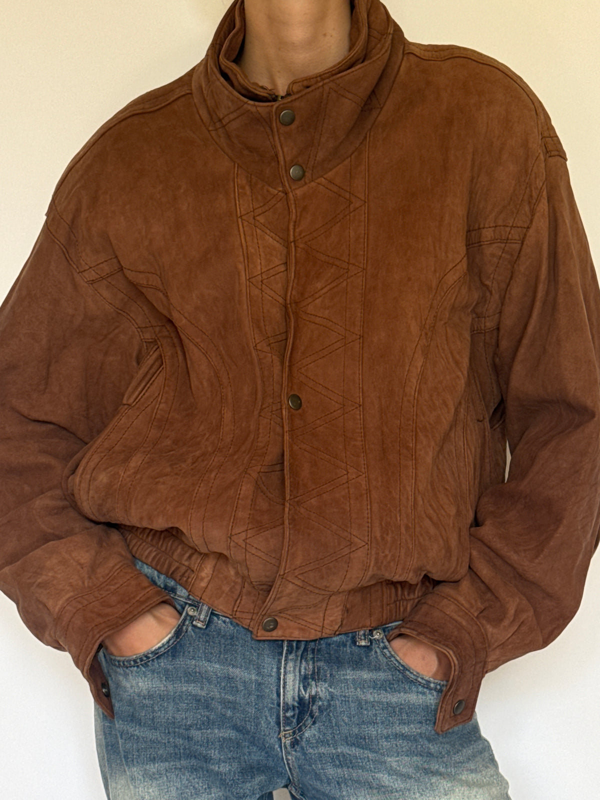 Vintage brown leather bomber jacket front view