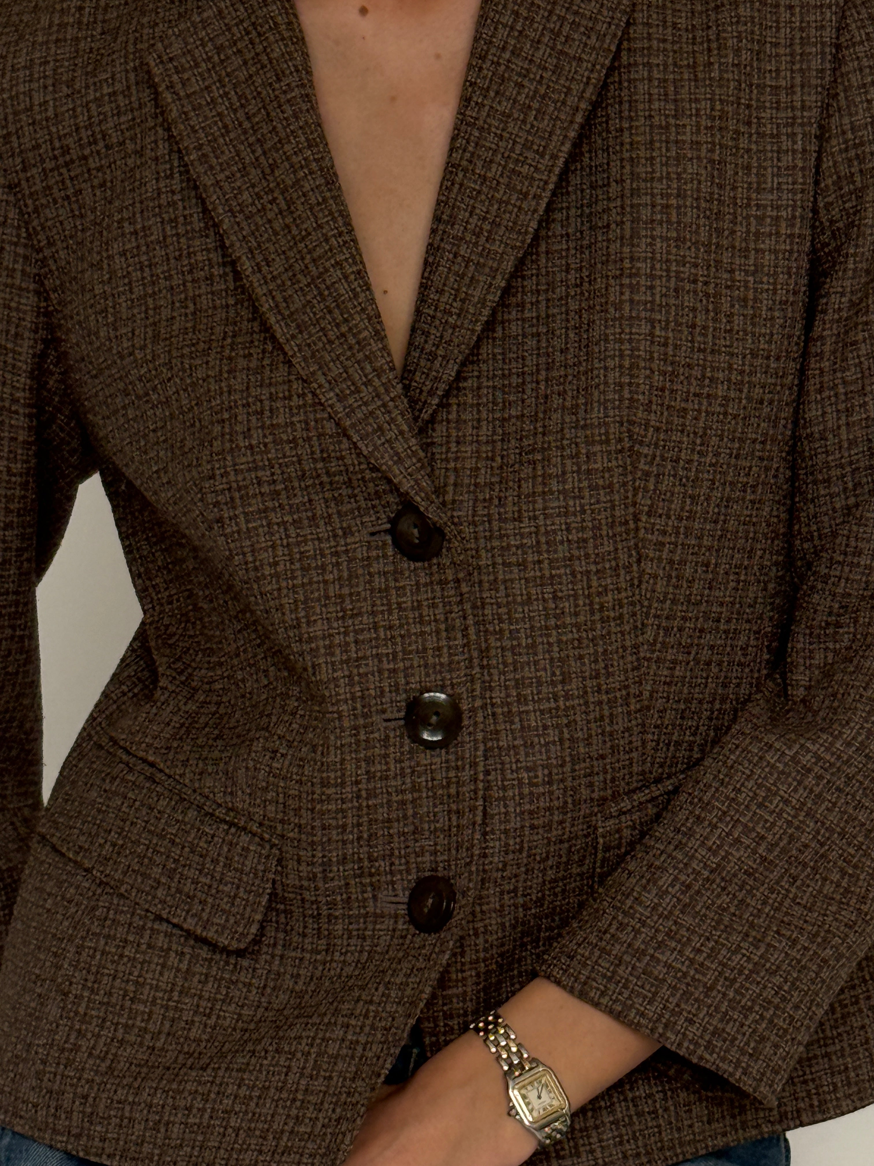 Vintage brown textured blazer fabric close-up