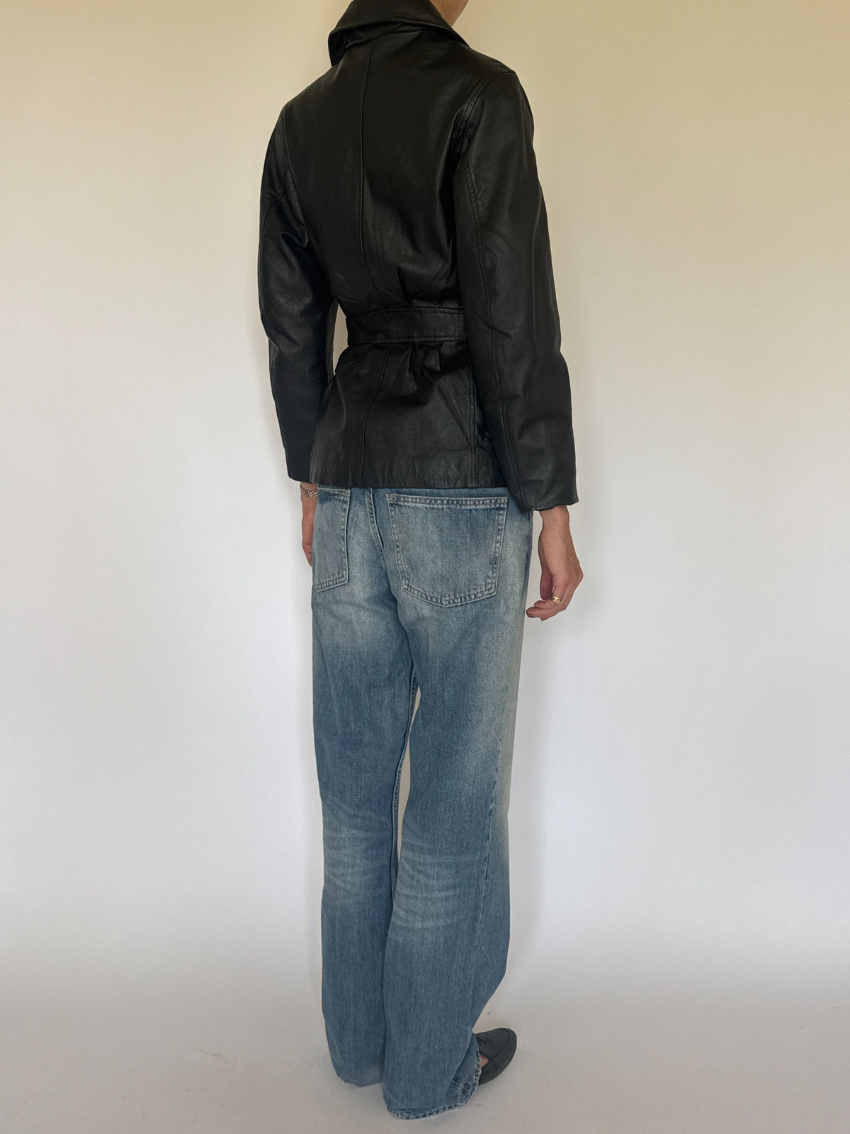 Vintage belted leather jacket black back view