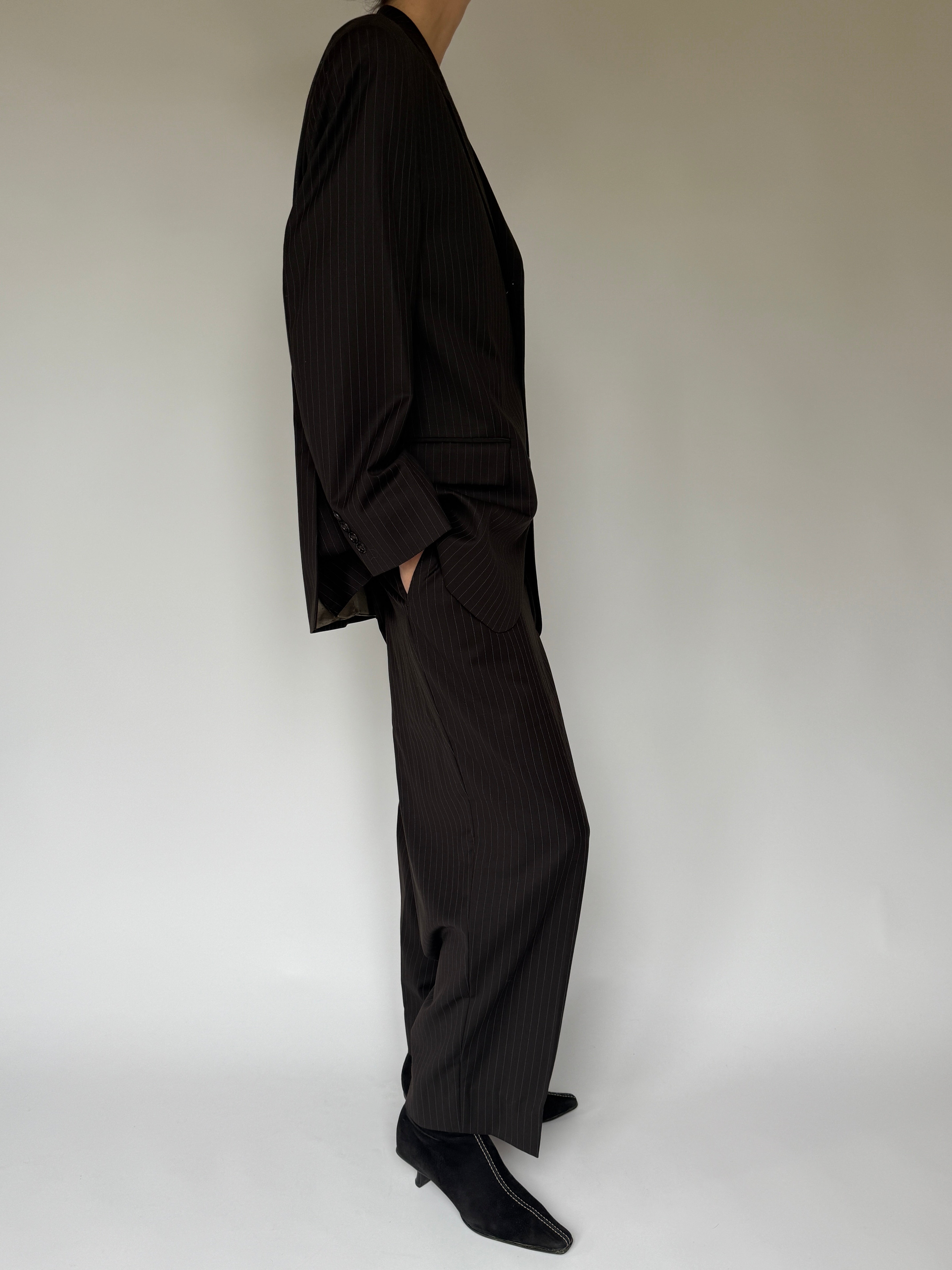Side view of oversized vintage pinstripe suit