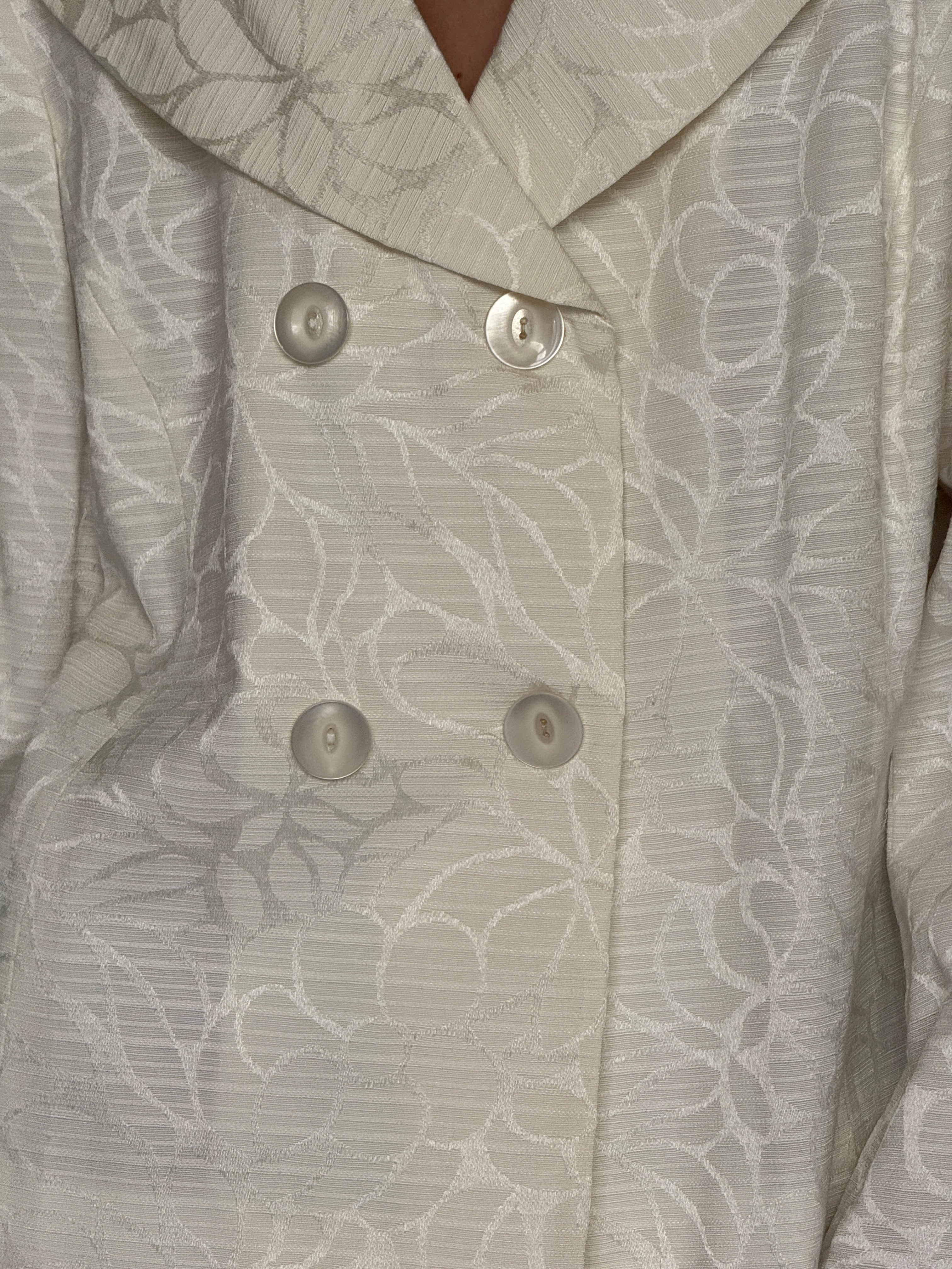 Vintage ivory floral jacquard blazer fabric texture close-up