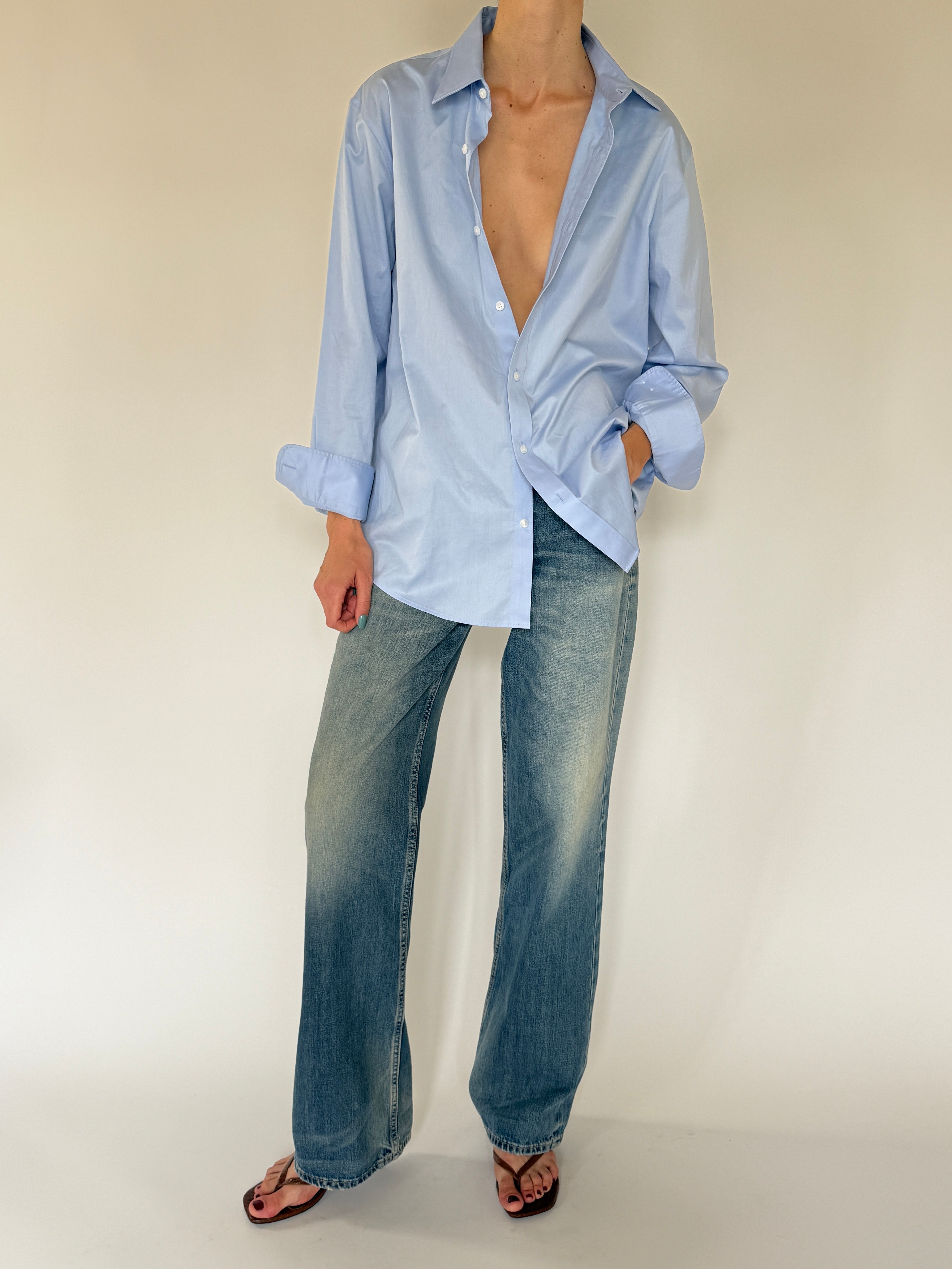 Vintage oversized light blue shirt styled with denim