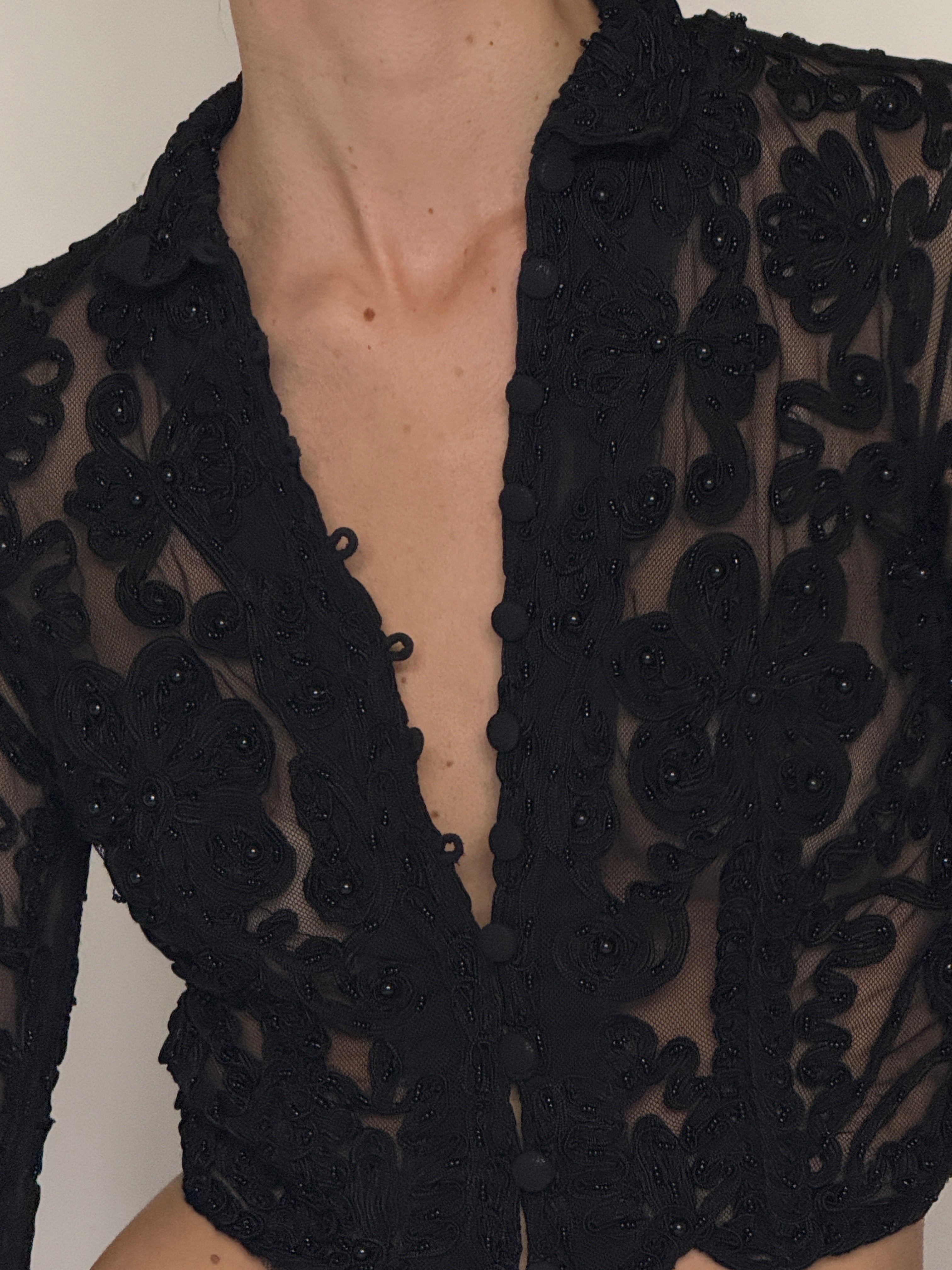Vintage sheer embroidered mesh top black fabric close-up