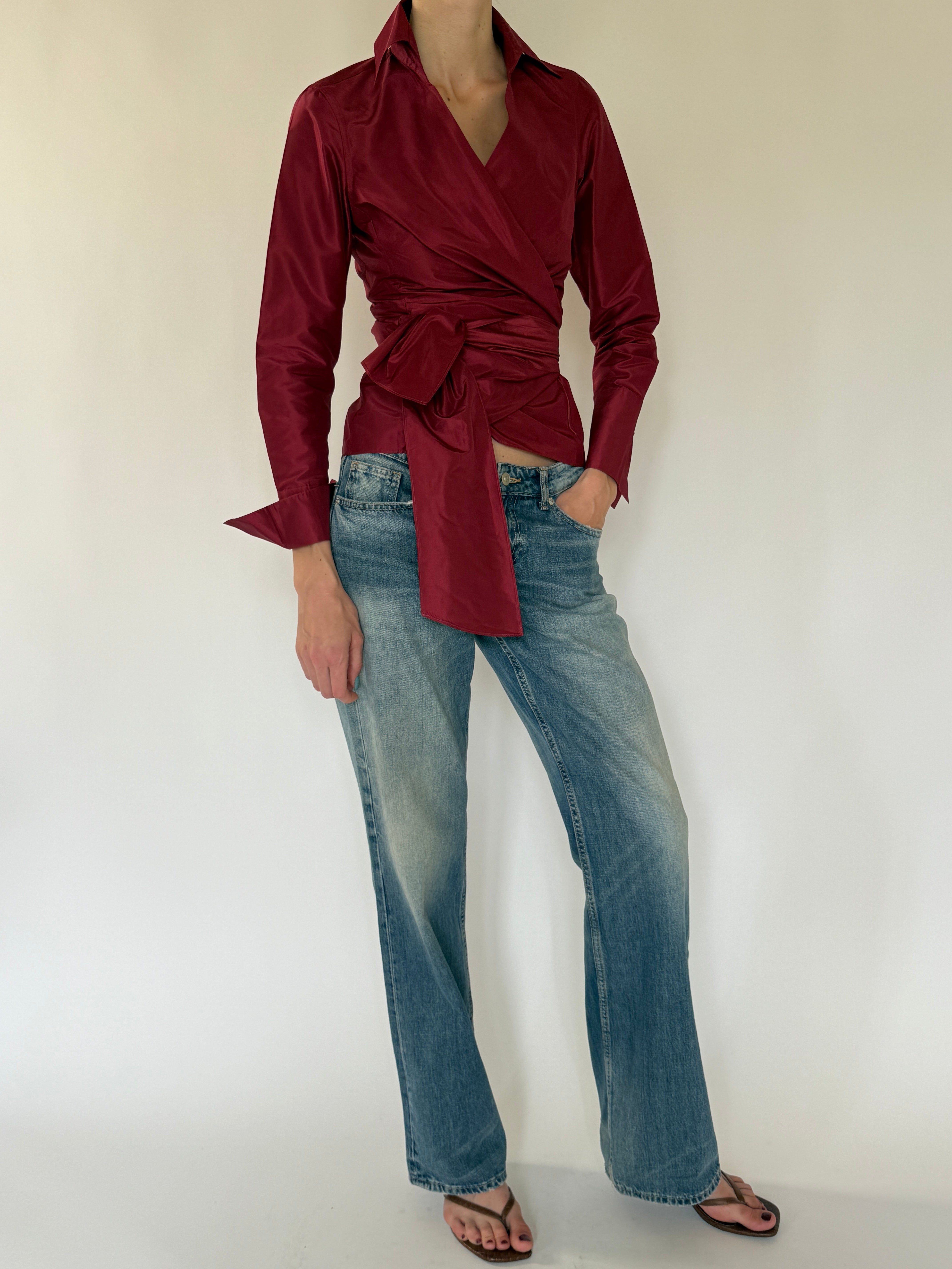 Vintage burgundy wrap blouse styled with denim full view