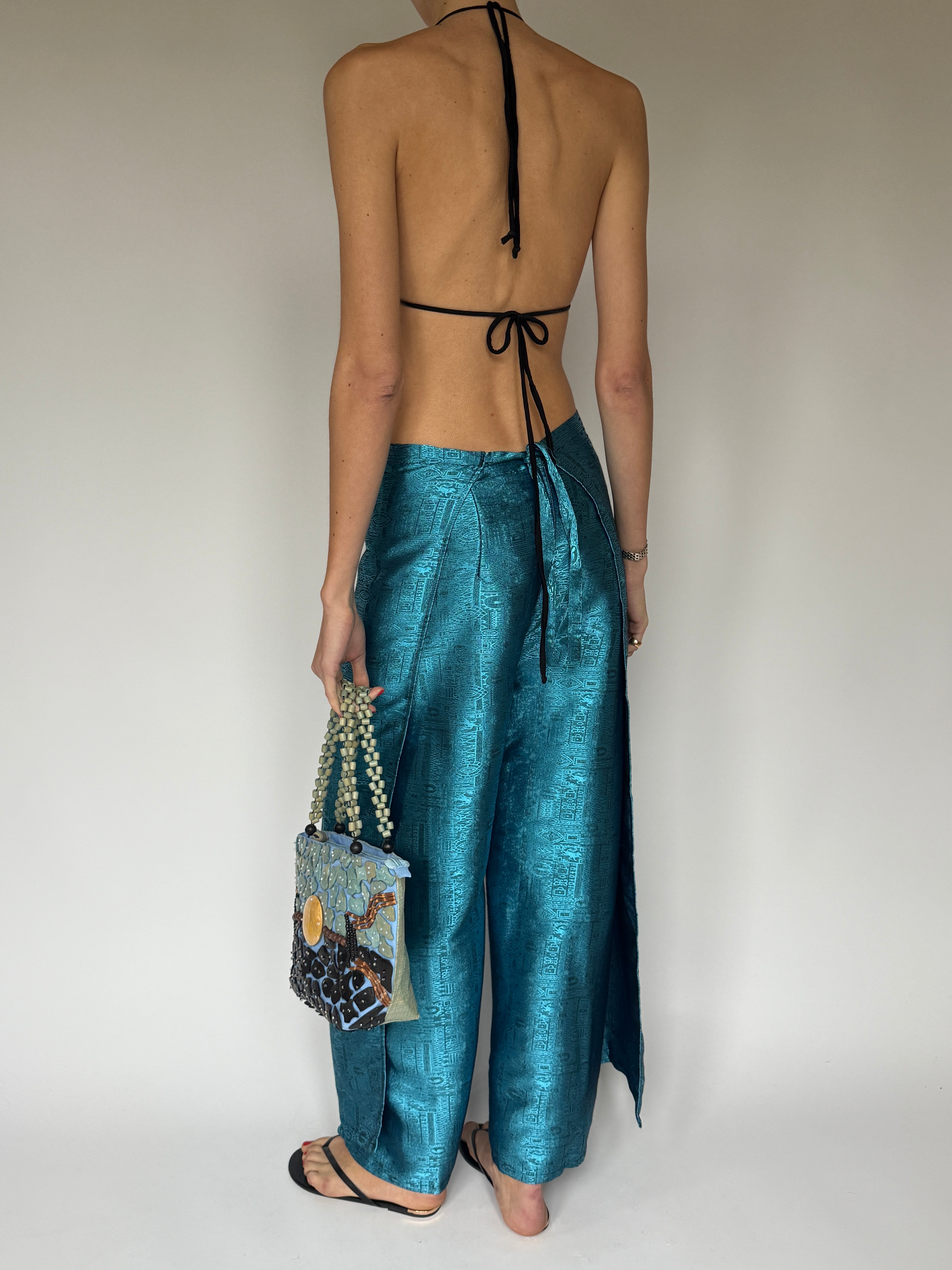 Vintage metallic wrap trousers back view