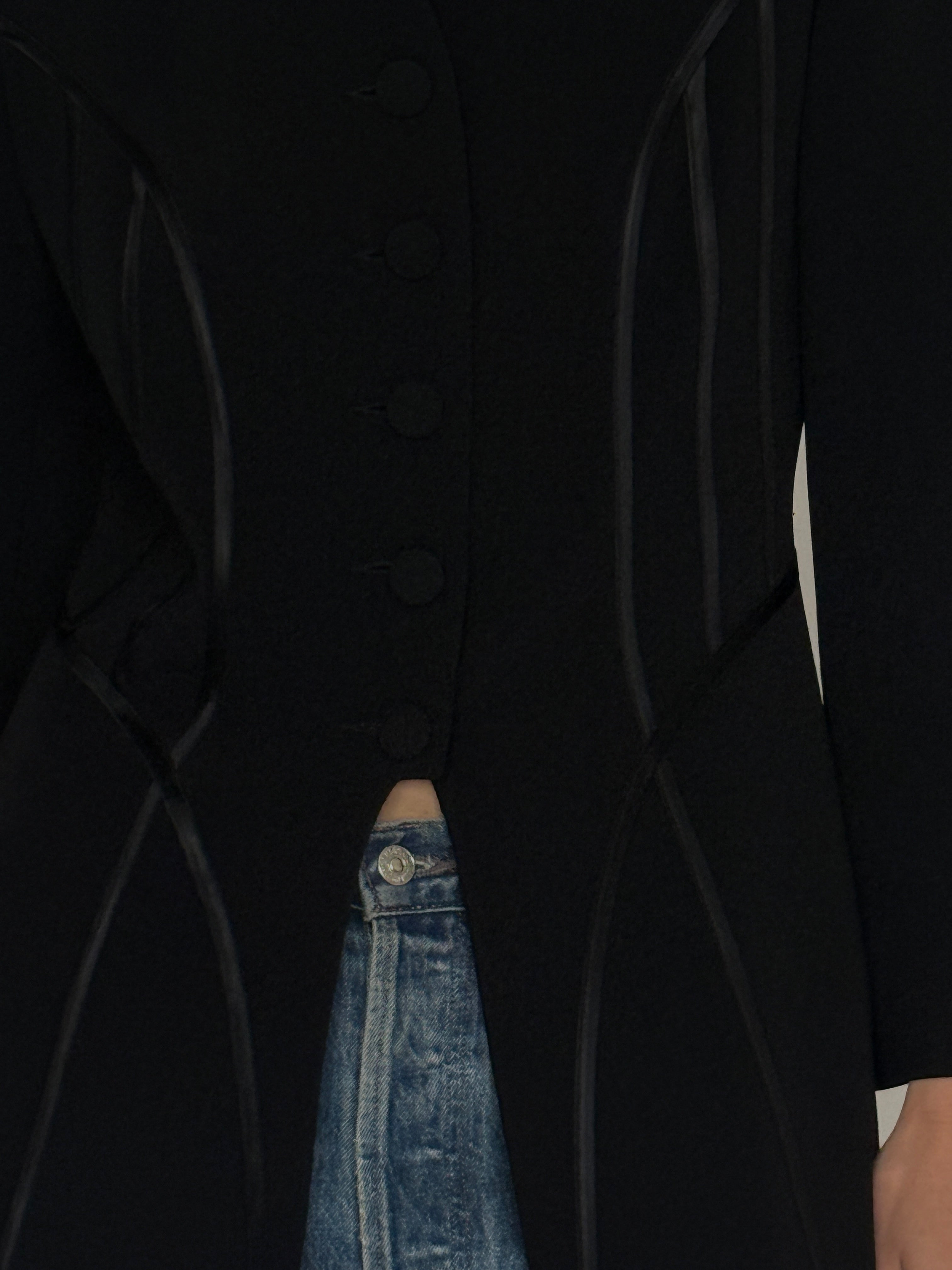 Vintage black blazer made in Paris fabric close-up