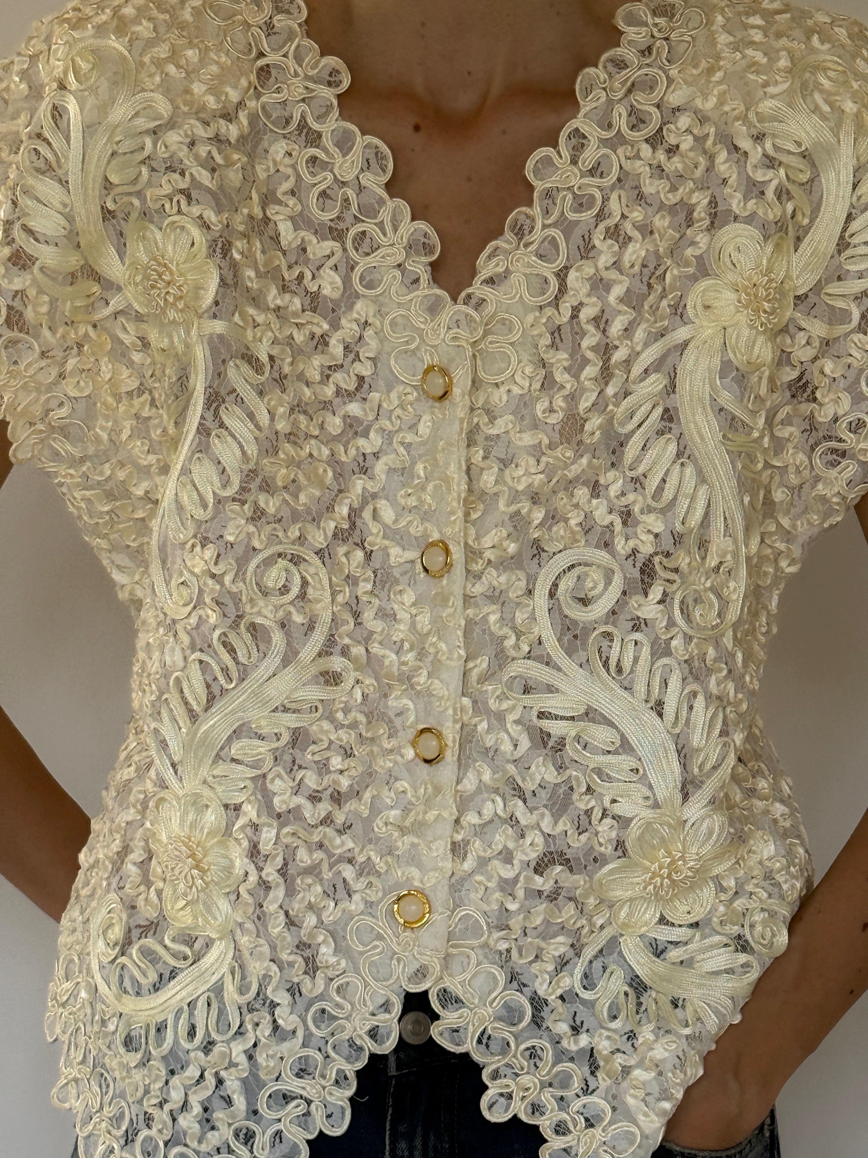Vintage cream lace floral top front view with embroidered appliqué and gold-tone buttons