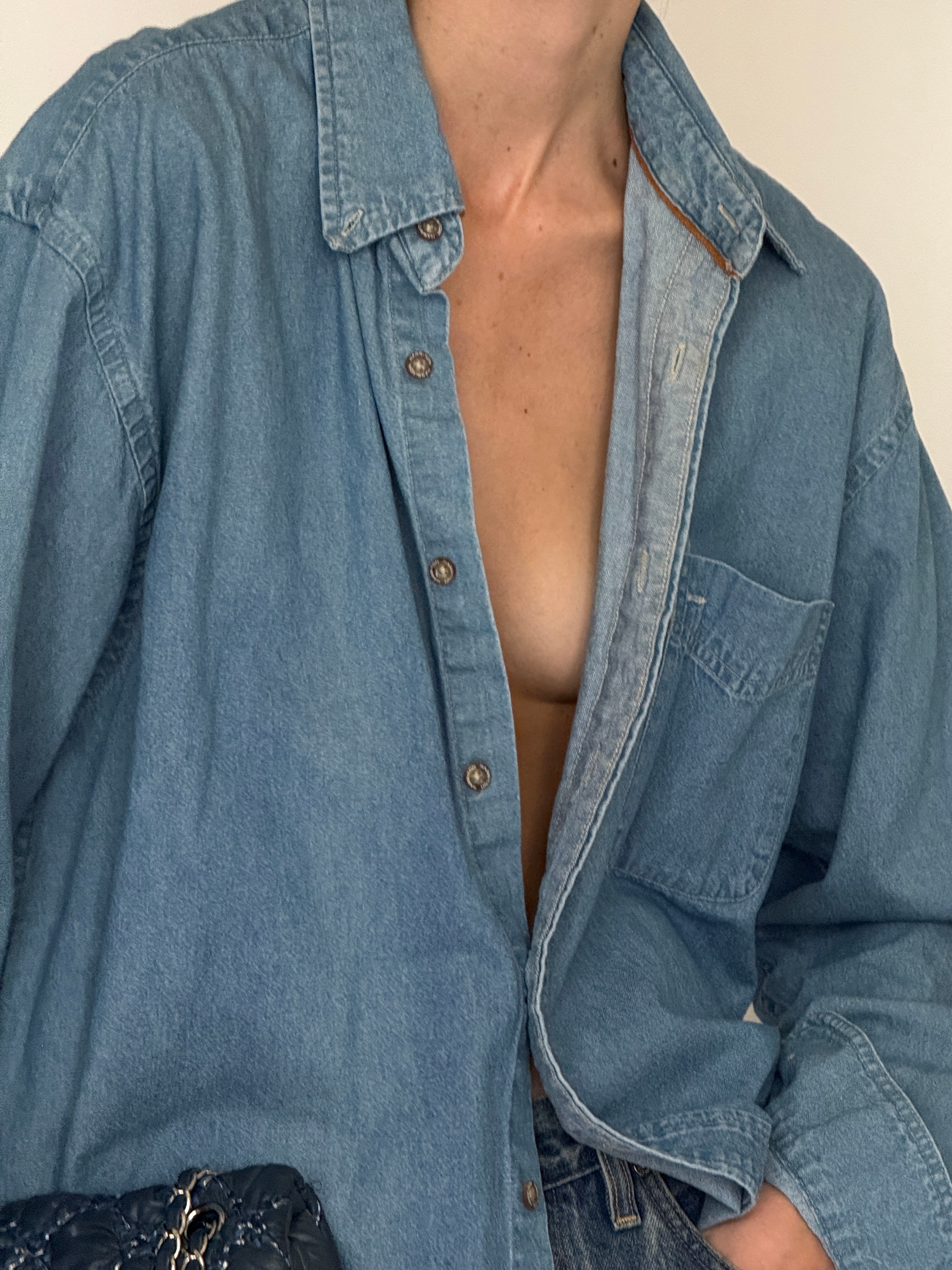 Vintage blue denim shirt button detail