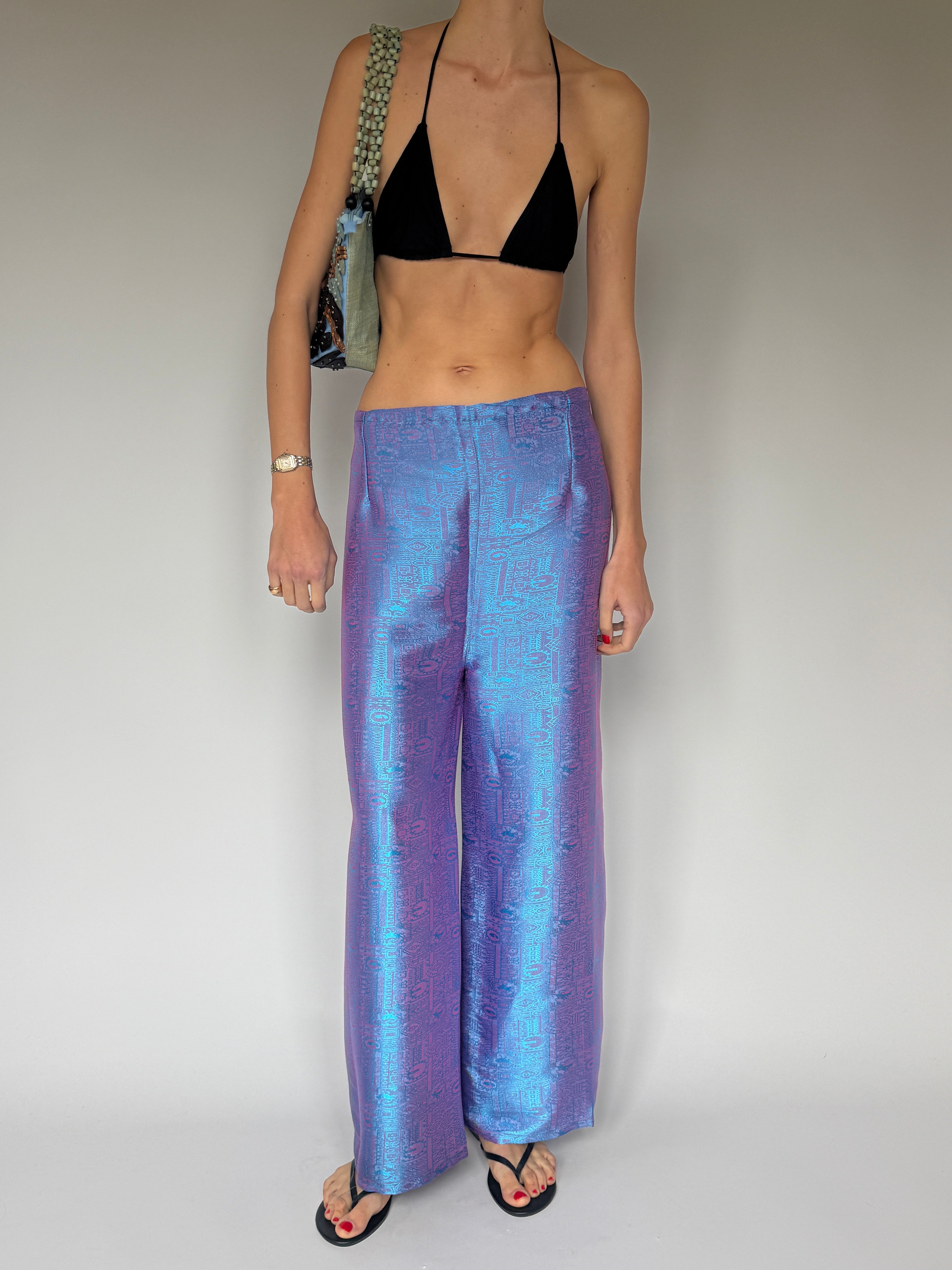 Vintage wrap-around trousers featuring fluid drape and straight leg in purple blue