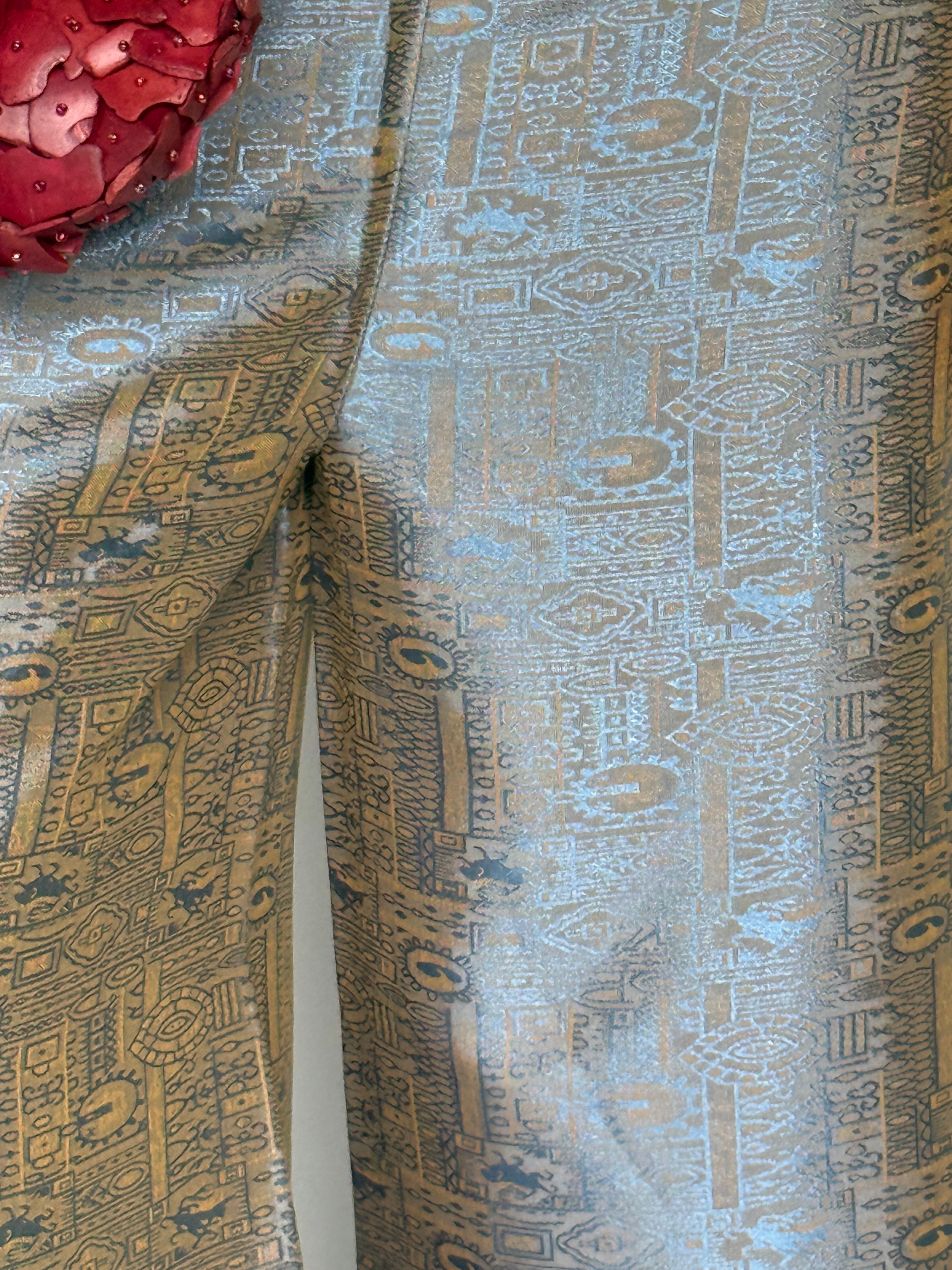 Vintage straight-leg trousers with light blue and tan abstract pattern