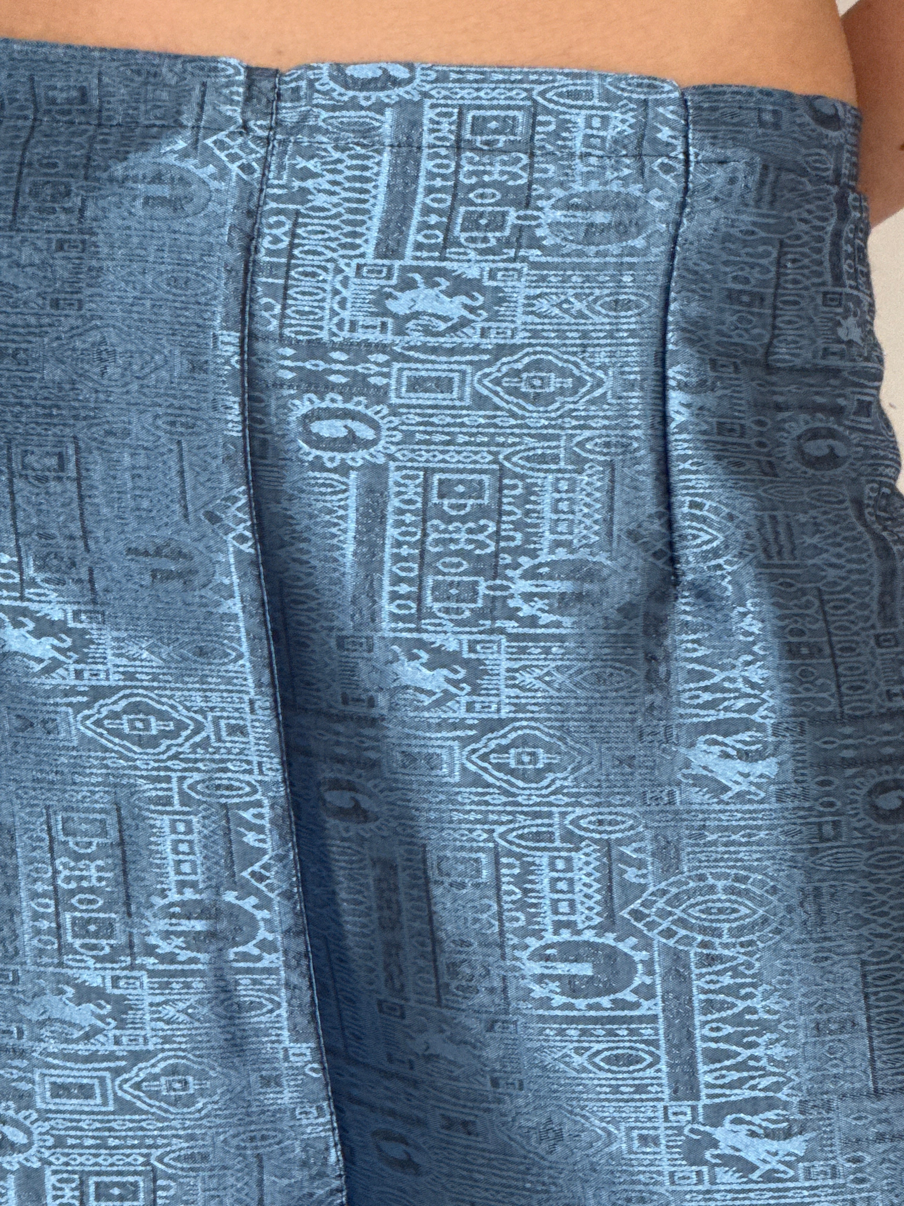 Vintage metallic blue jacquard trousers texture detail