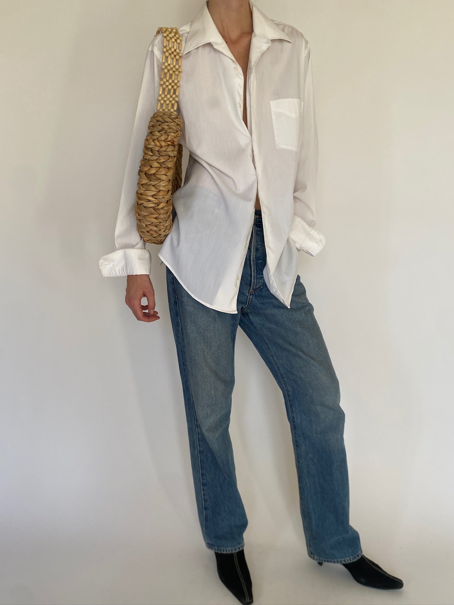 Vintage white oversized button-up shirt front view with chest pocket