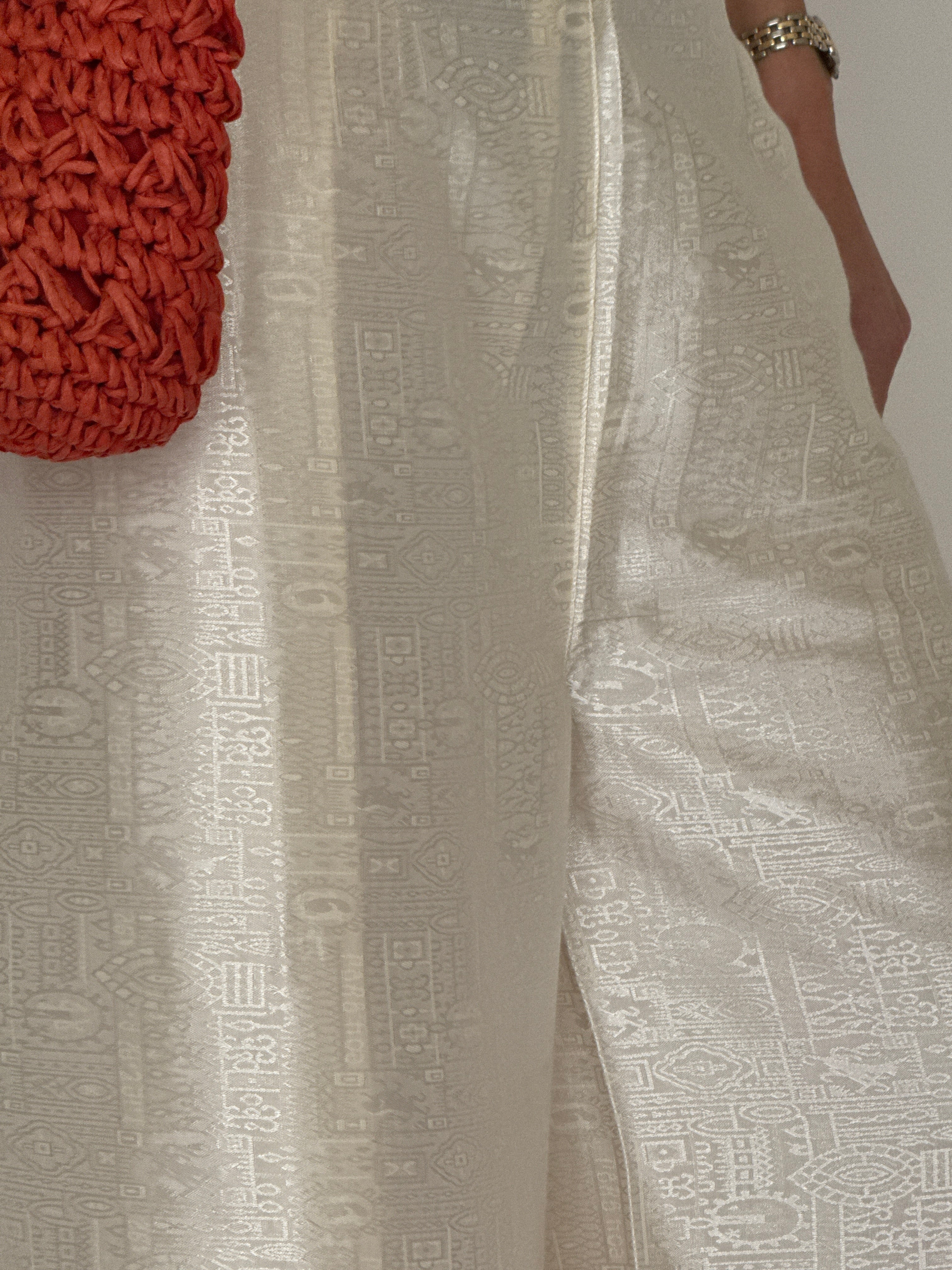 Vintage ivory jacquard fabric close-up