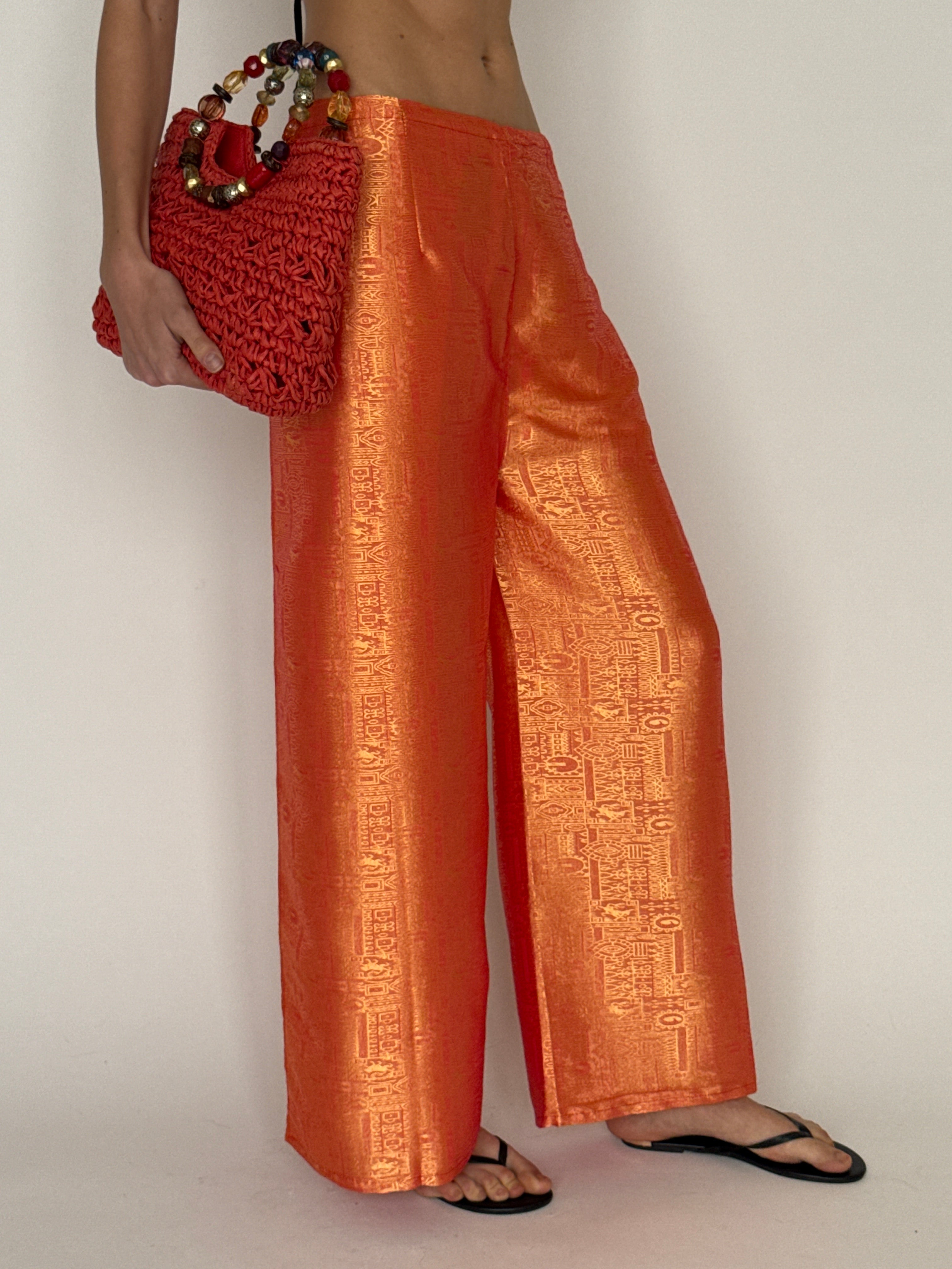 Vintage orange jacquard wide-leg trousers leg width detail