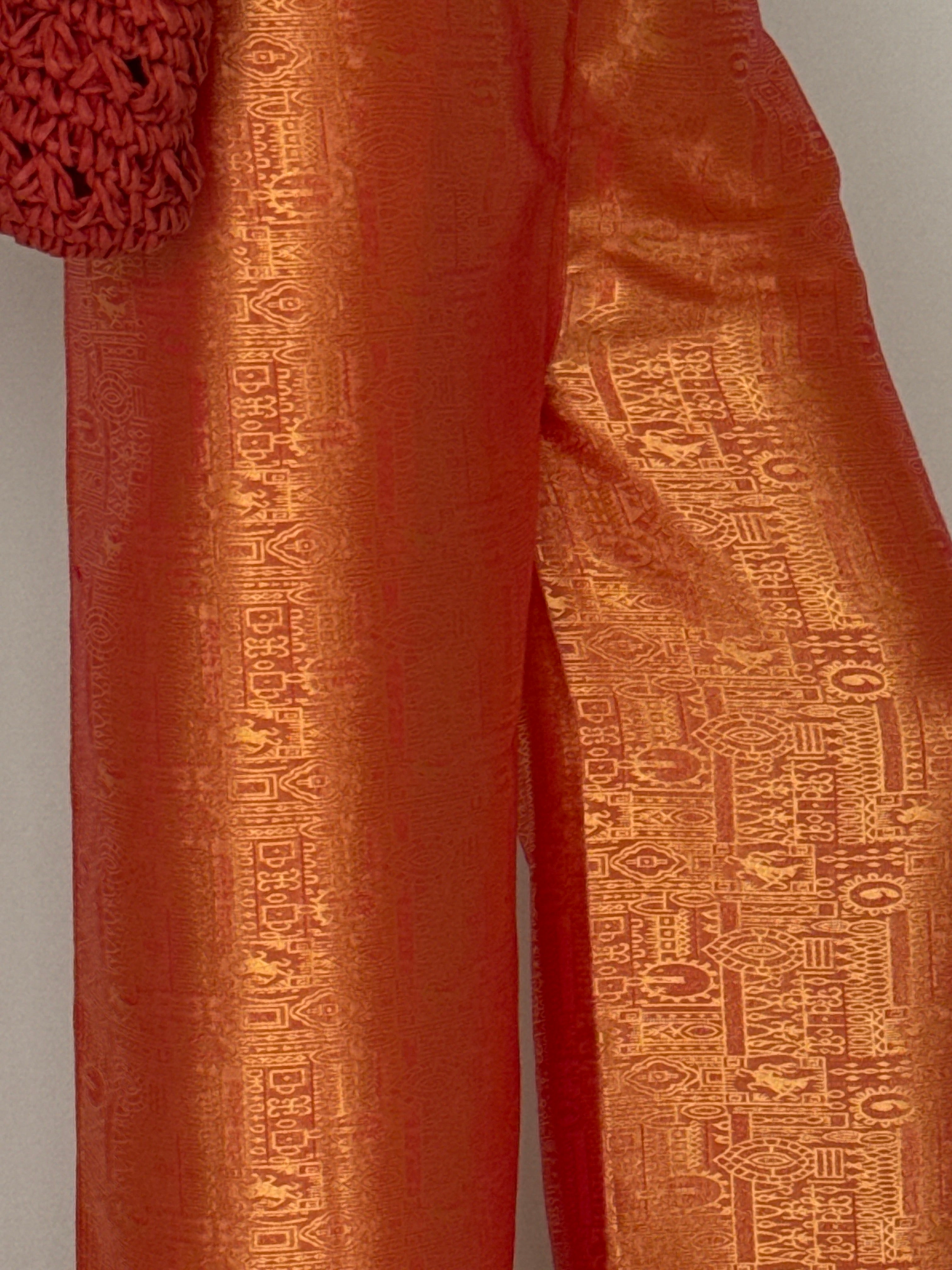 Vintage orange jacquard wide-leg trousers leg width detail