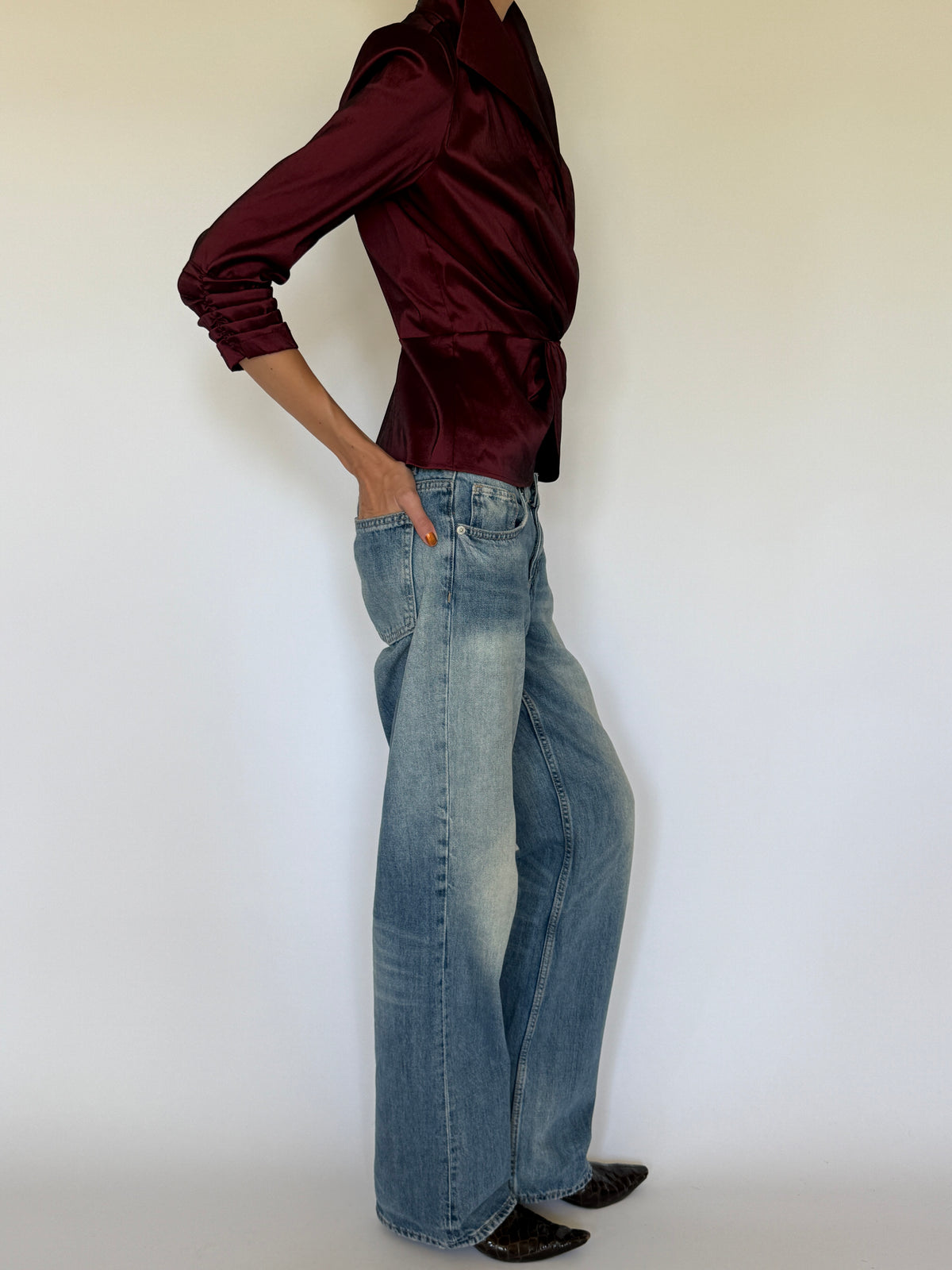 Vintage burgundy wrap blouse side view with peplum silhouette