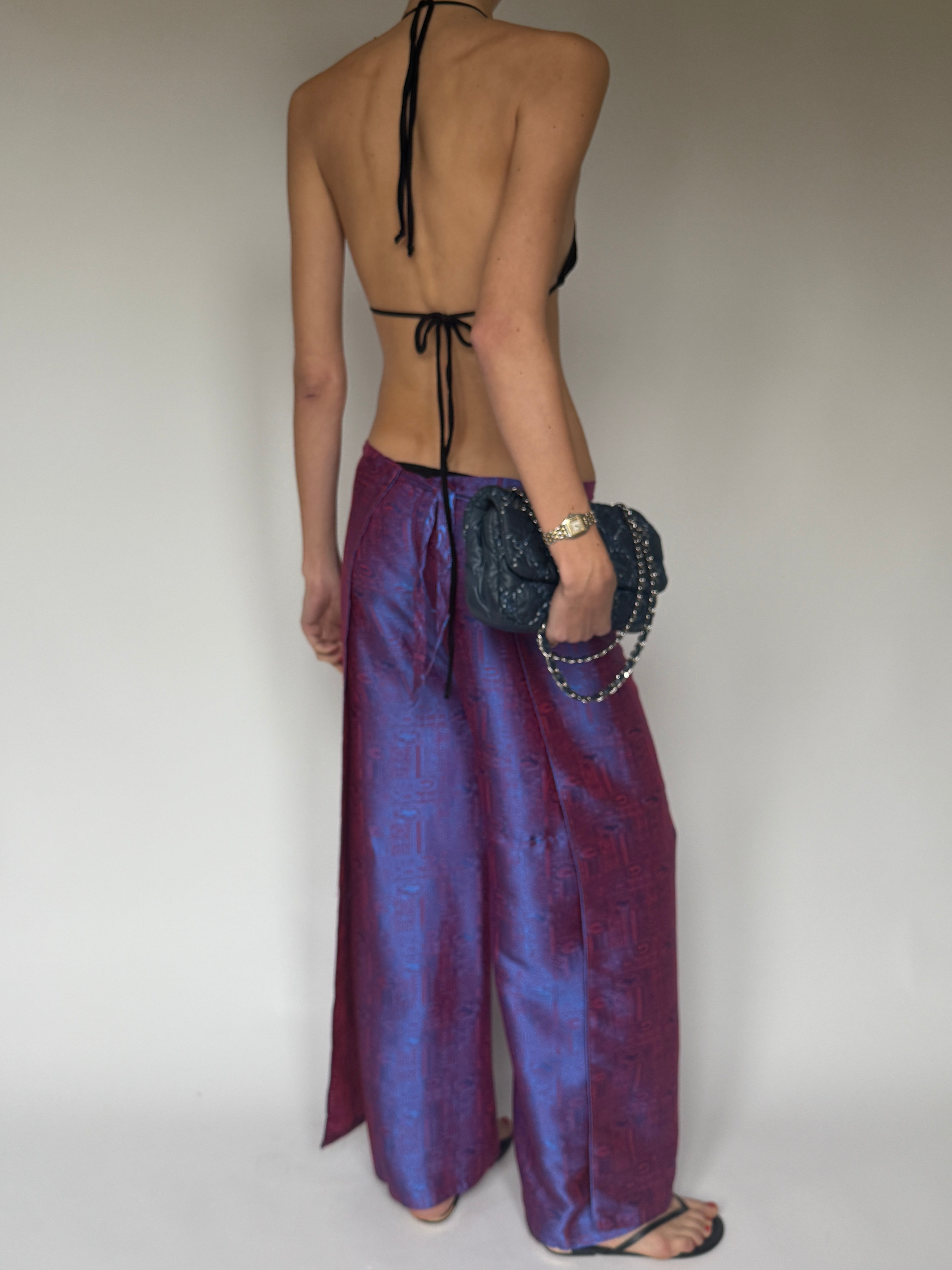 Vintage metallic blue and purple wrap pants movement view