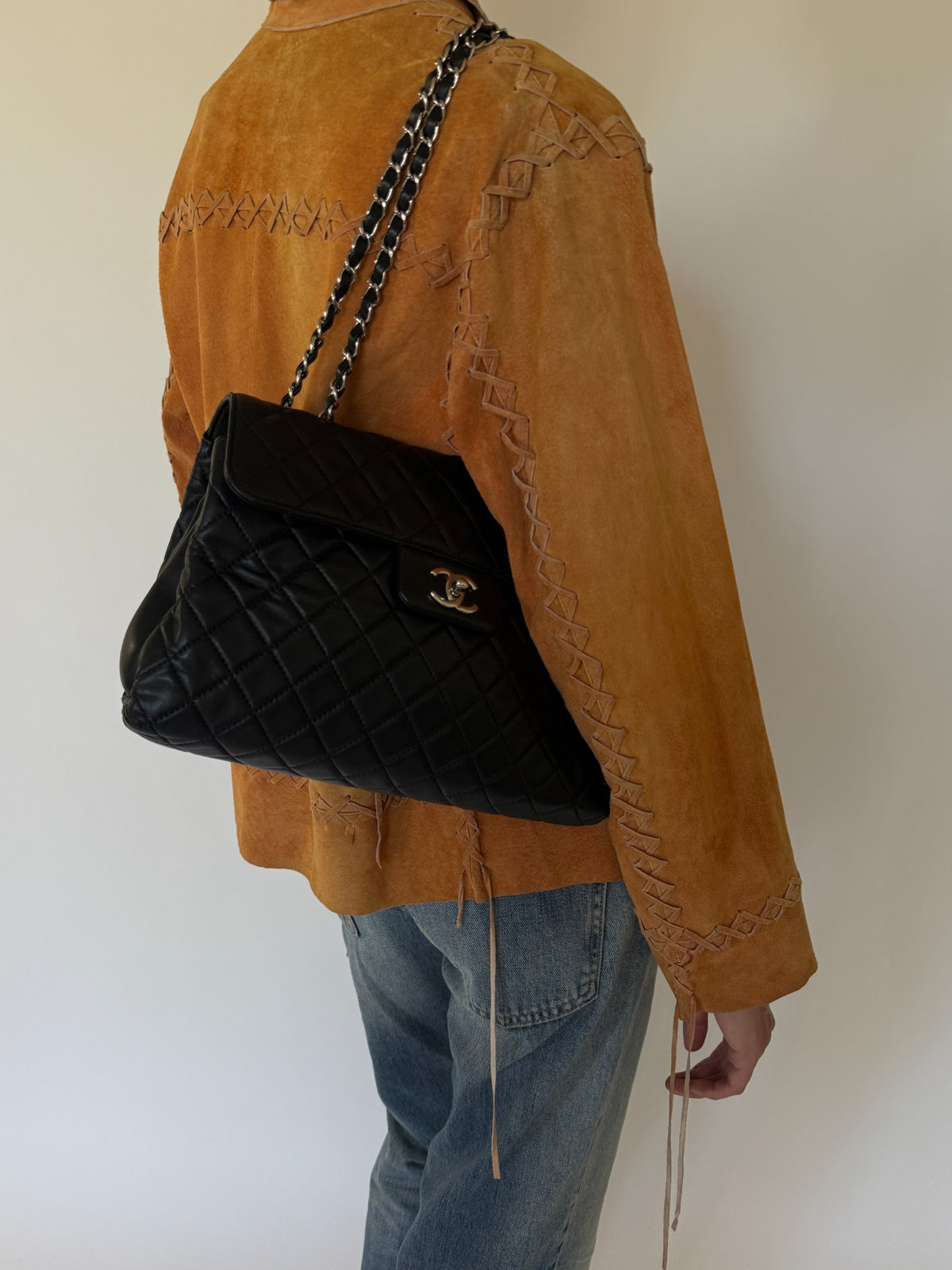 Vintage burnt orange suede leather jacket angled back view