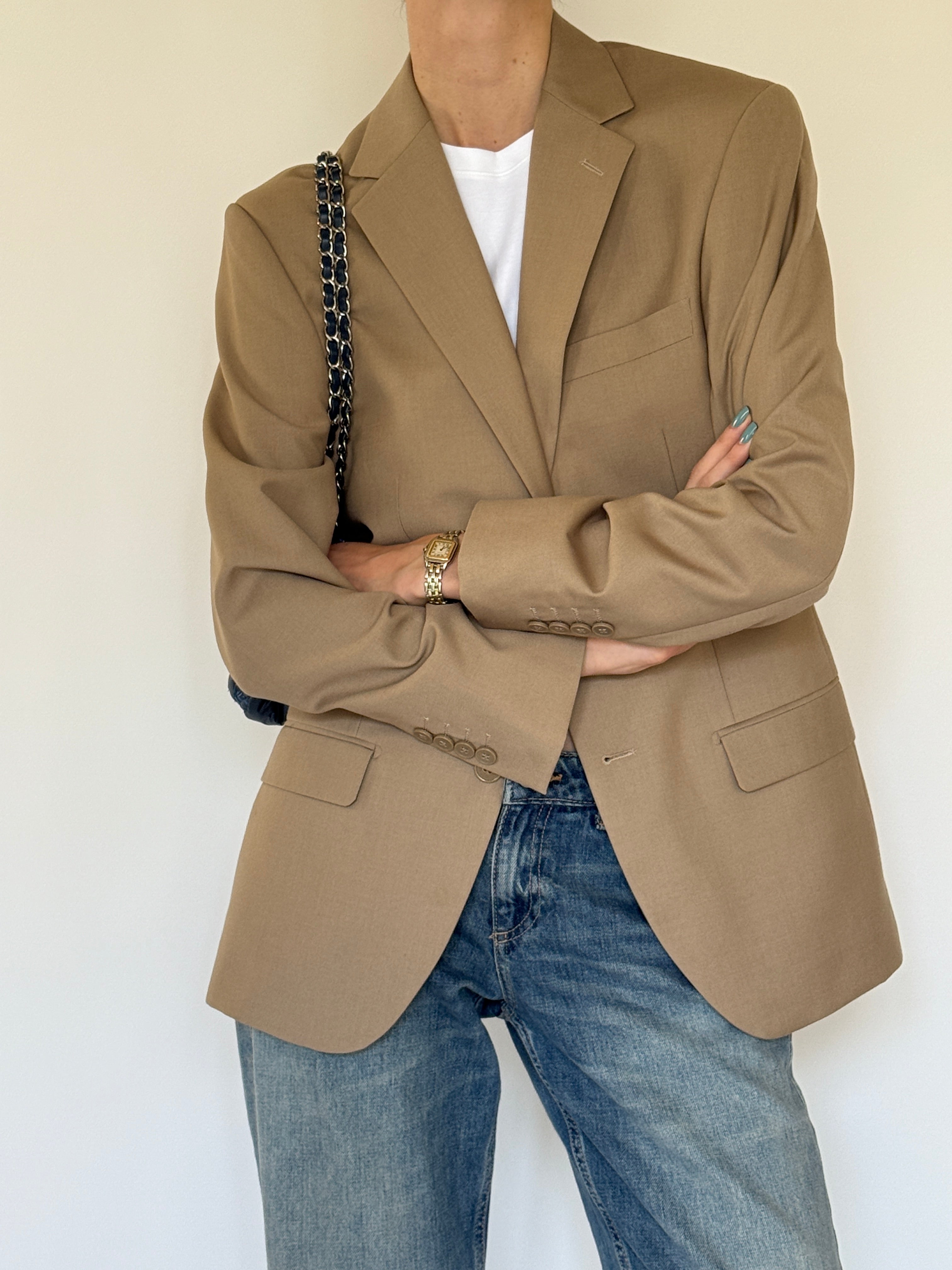 Vintage camel blazer close-up of lapel and front buttons