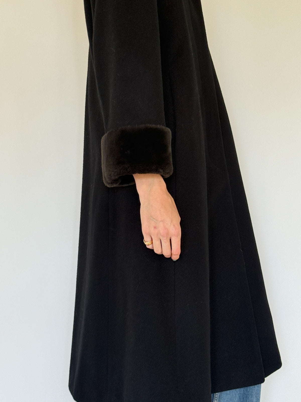 Vintage black wool coat faux fur cuff close-up