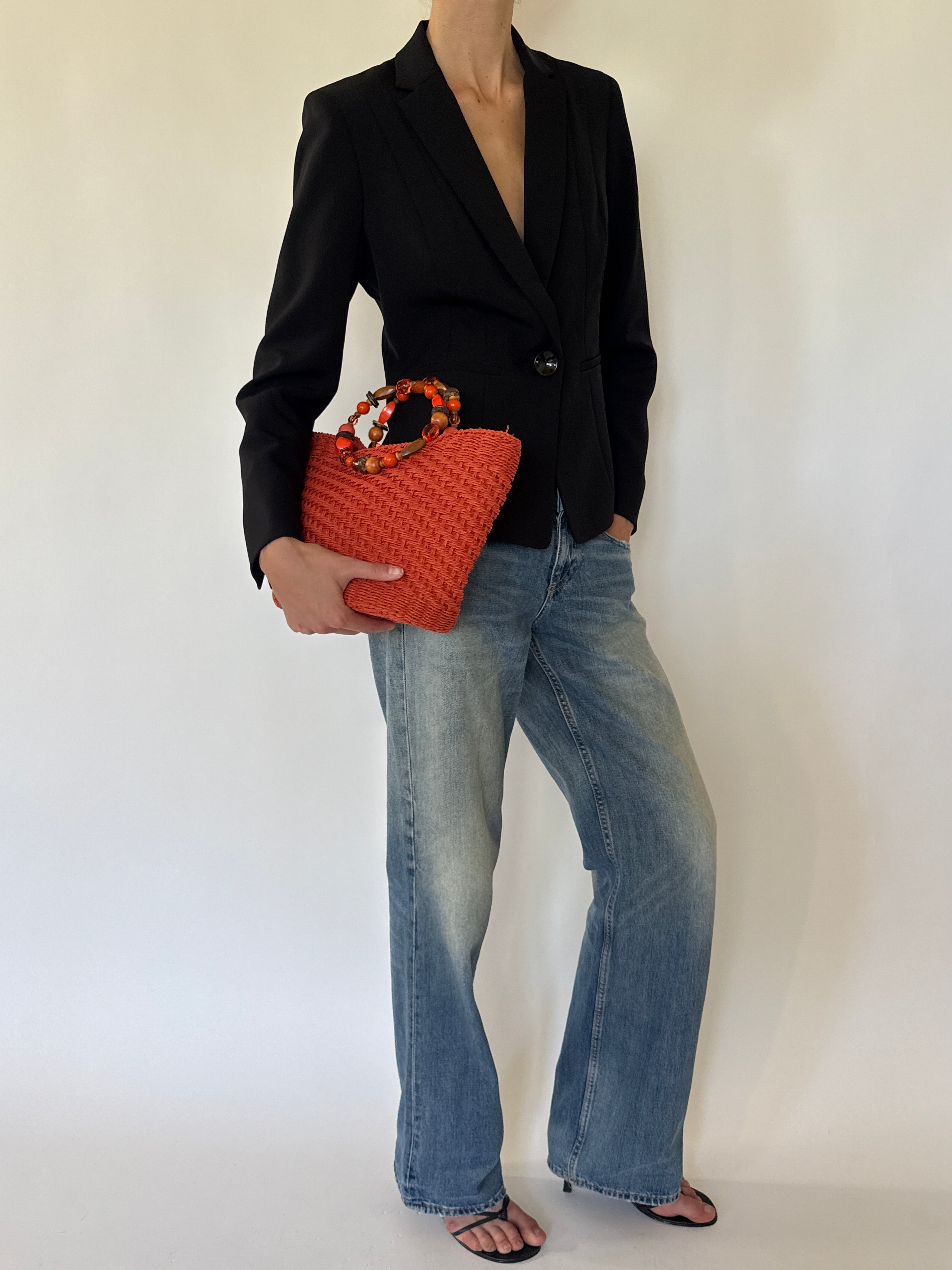 Vintage black fitted blazer angled front view