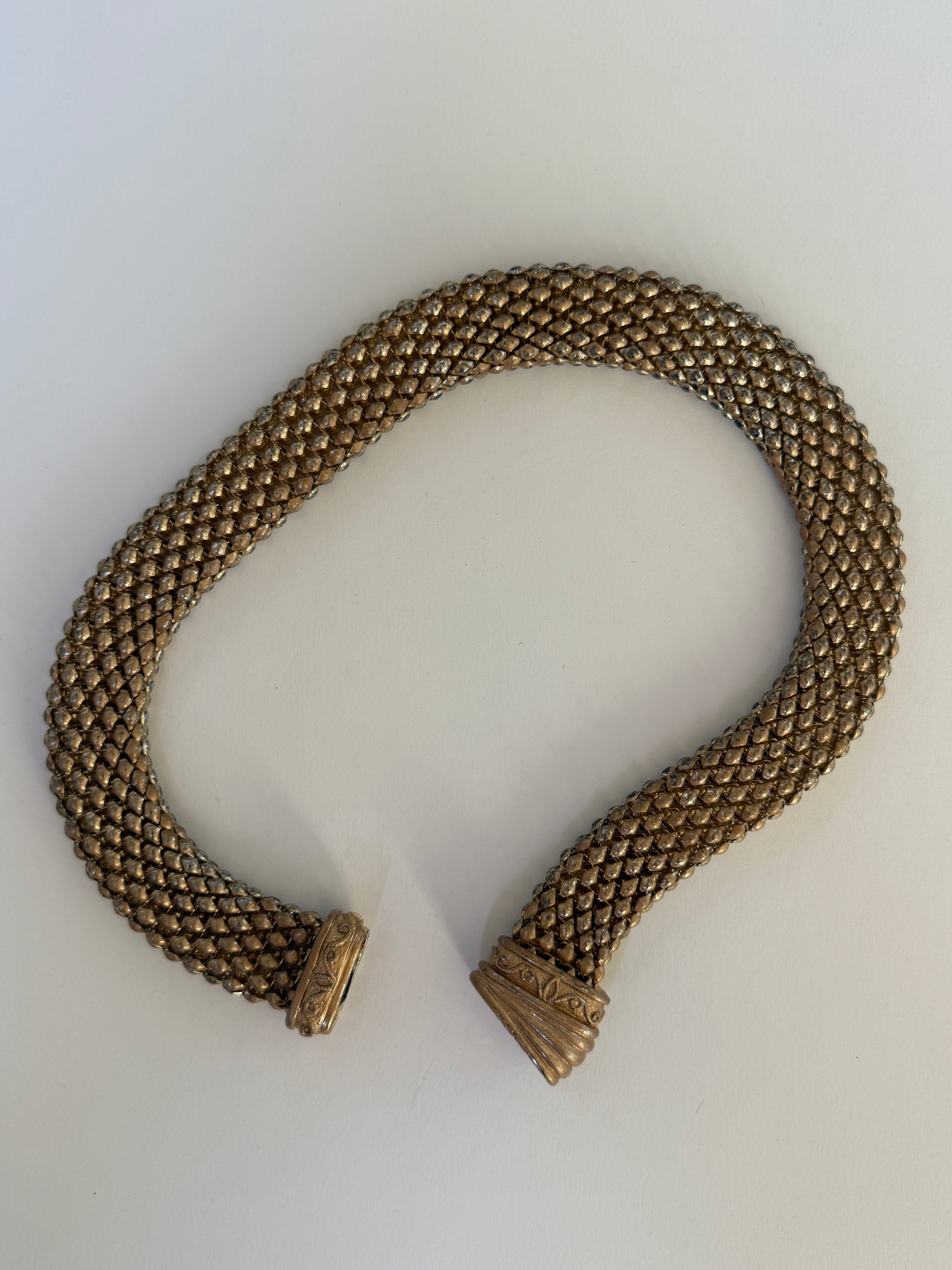 Vintage gold-tone statement necklace flat lay