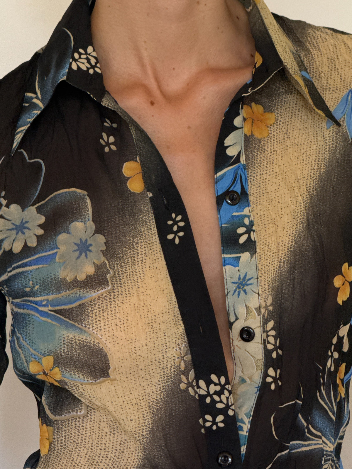 Vintage floral shirt button and collar detail
