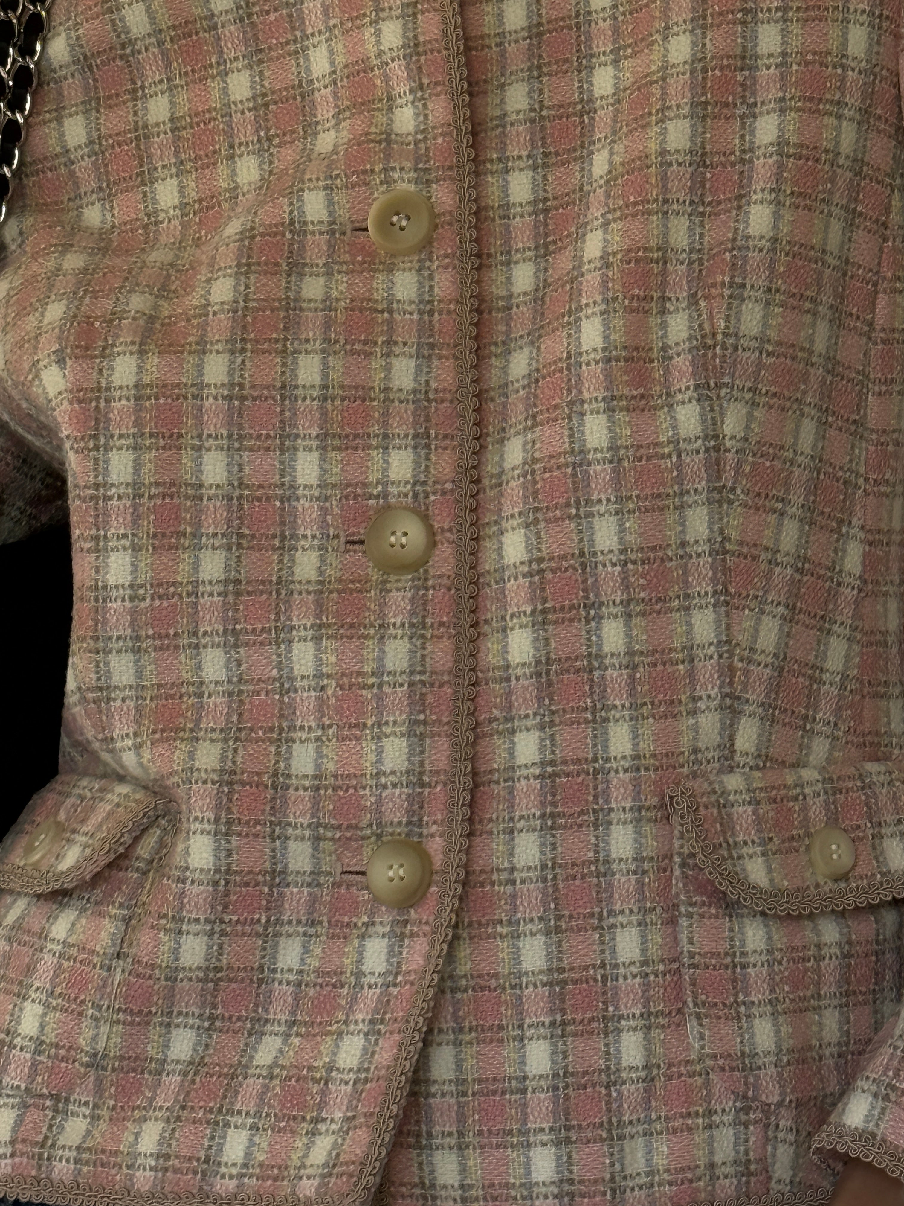 Vintage pink and cream tweed fabric close-up