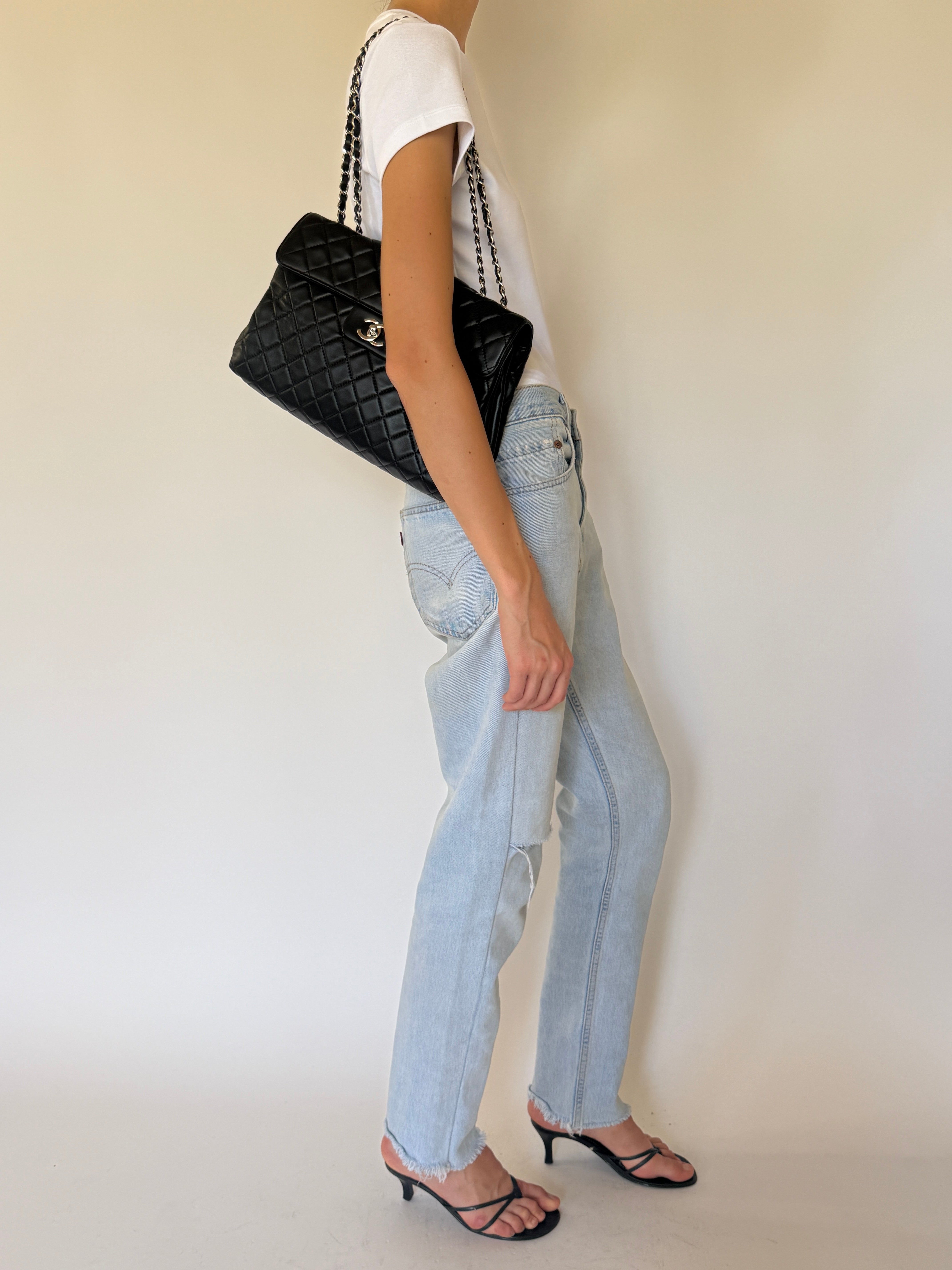Vintage Levi's 550 light wash jeans side view