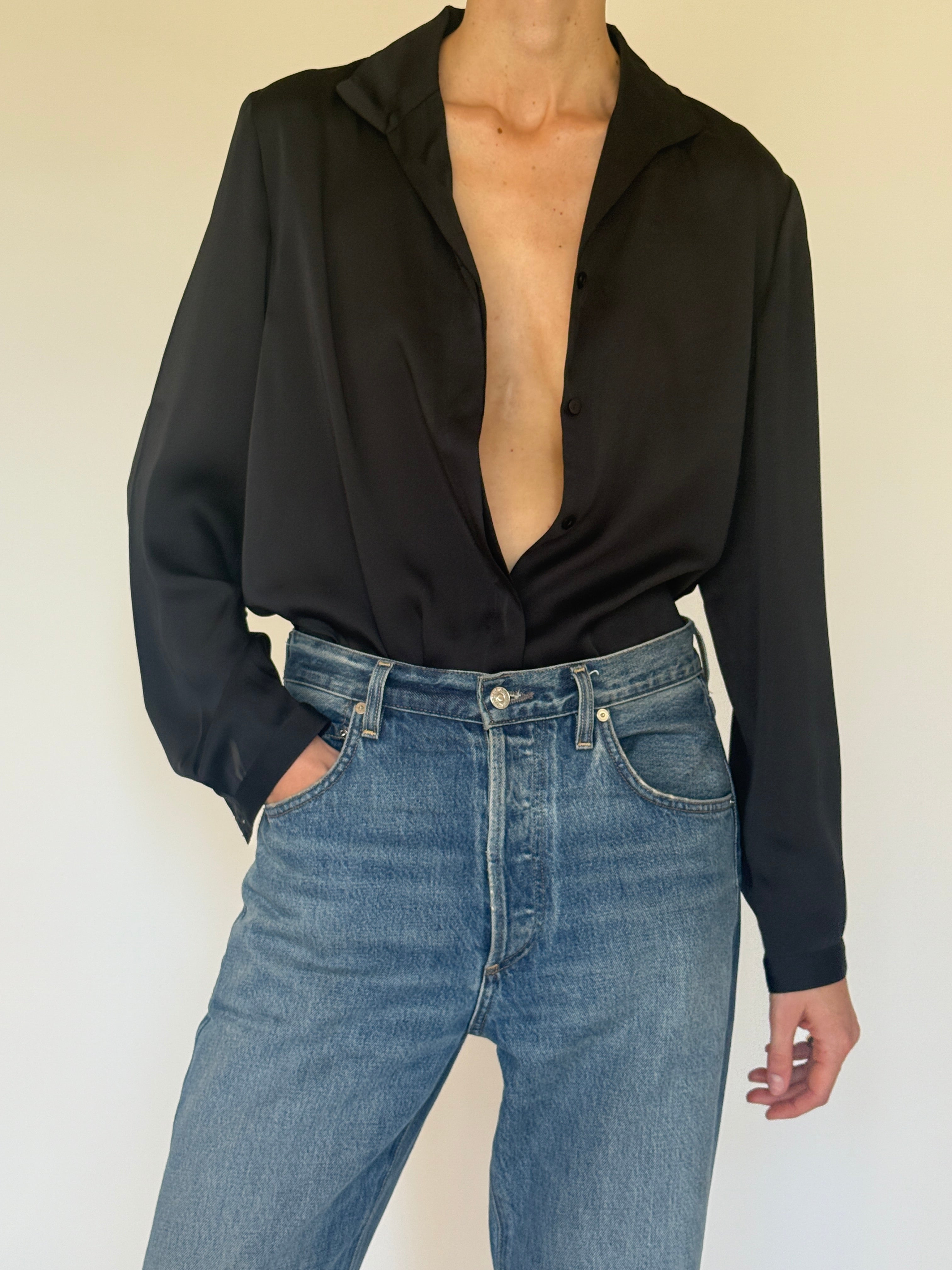 Vintage black fluid blouse button closure detail