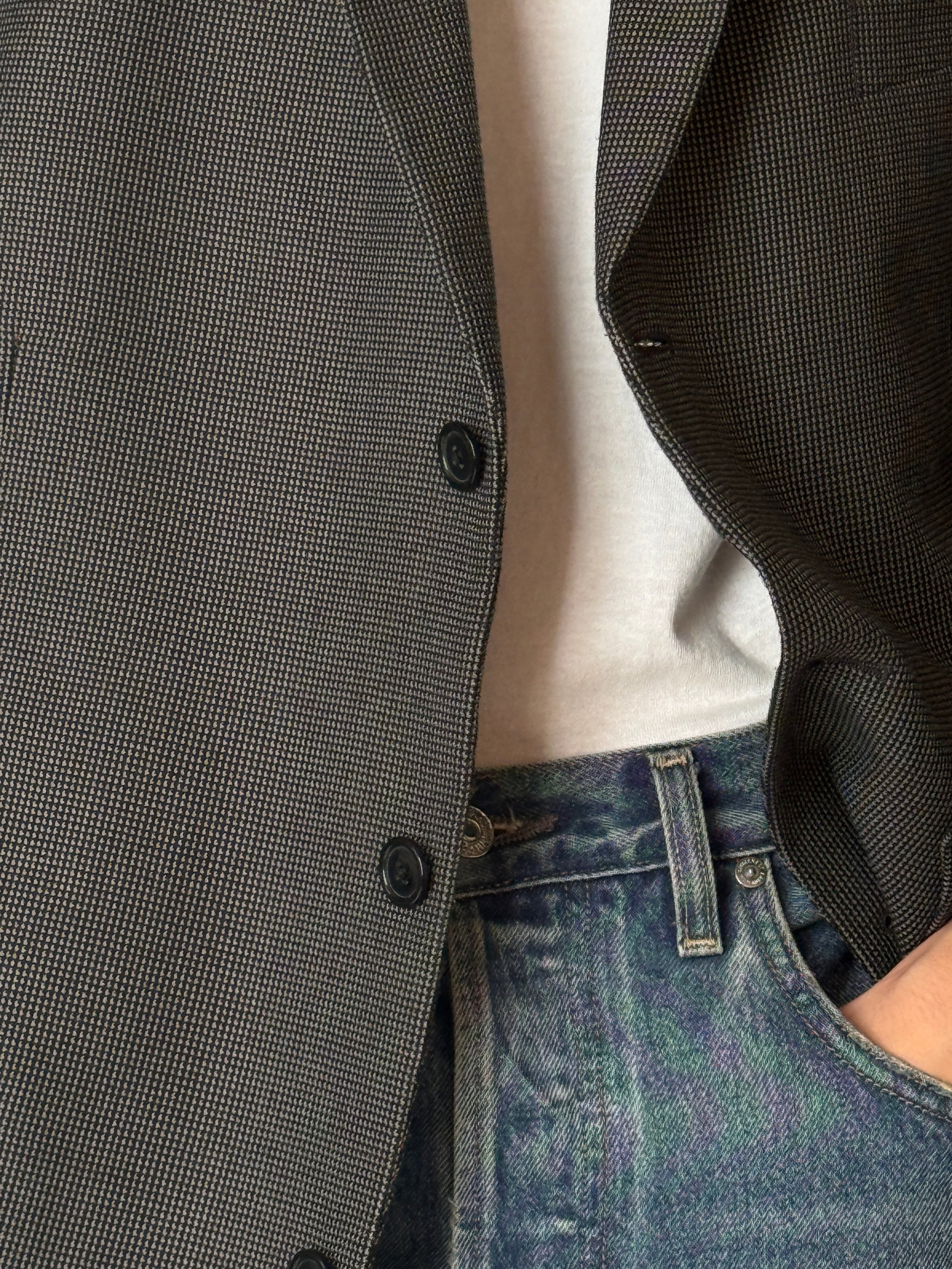 Vintage textured black and cream blazer close-up detail