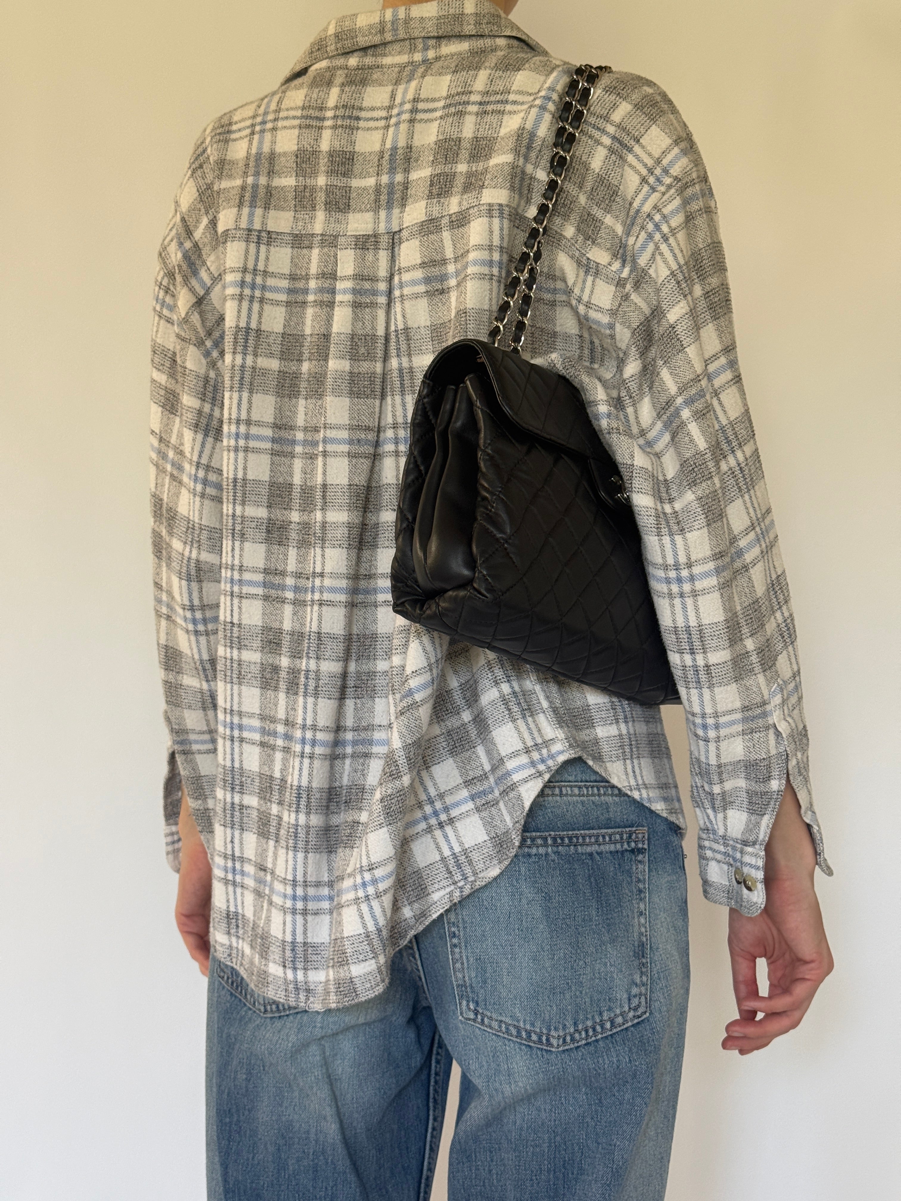 Vintage grey, ivory, and light blue plaid flannel shirt back view