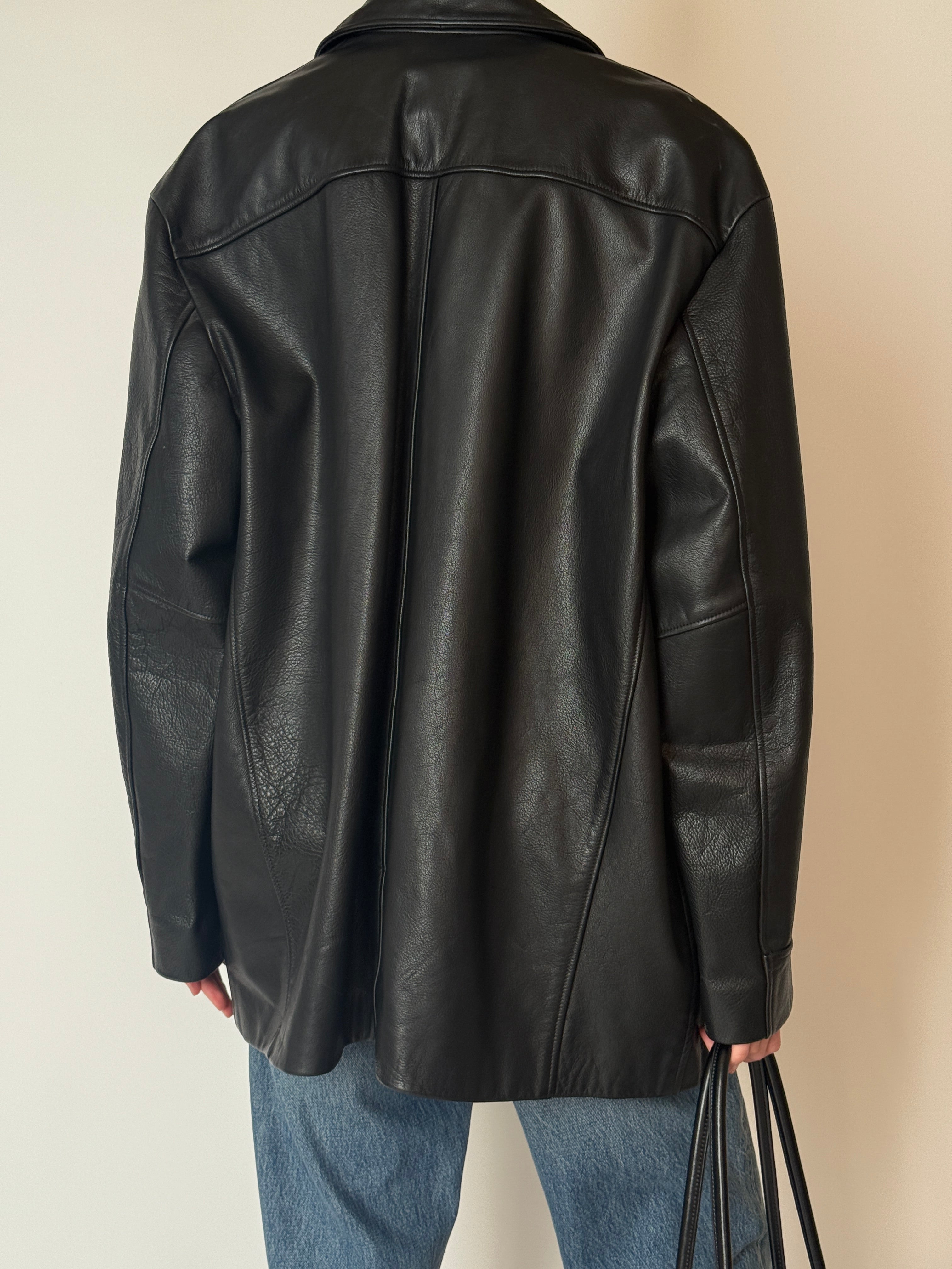 Vintage relaxed leather jacket with collar and button closure black back view