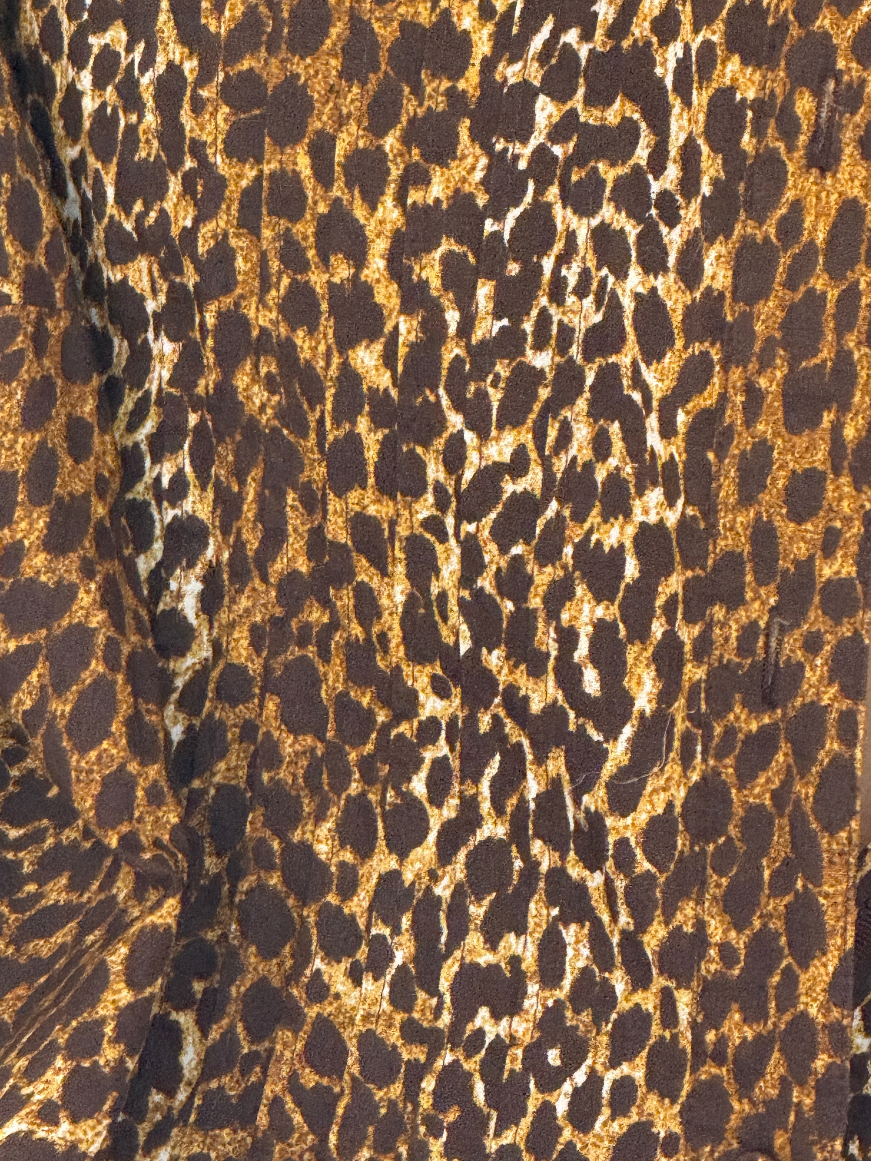 Vintage leopard print shirt fabric close-up lightweight texture