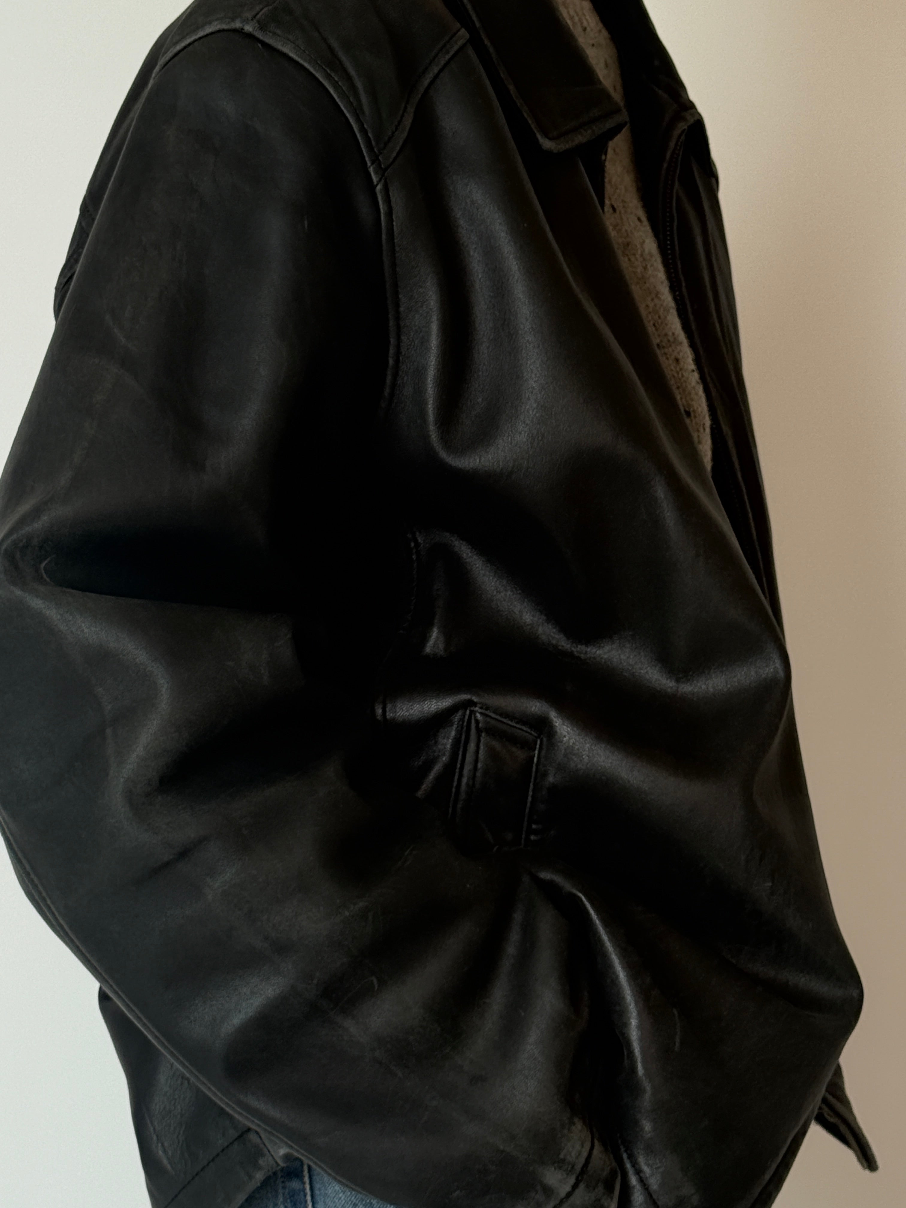 Soft black leather jacket with side pockets