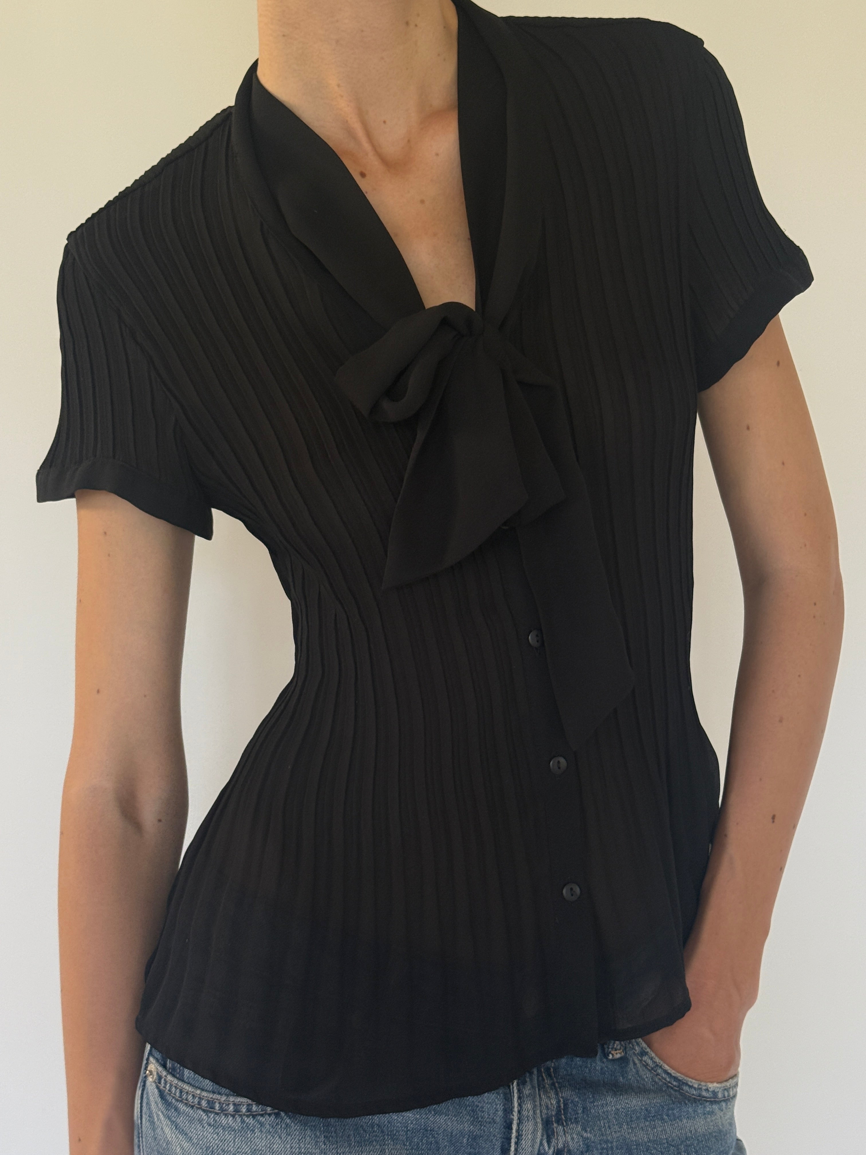 Vintage black pleated tie-neck blouse front view