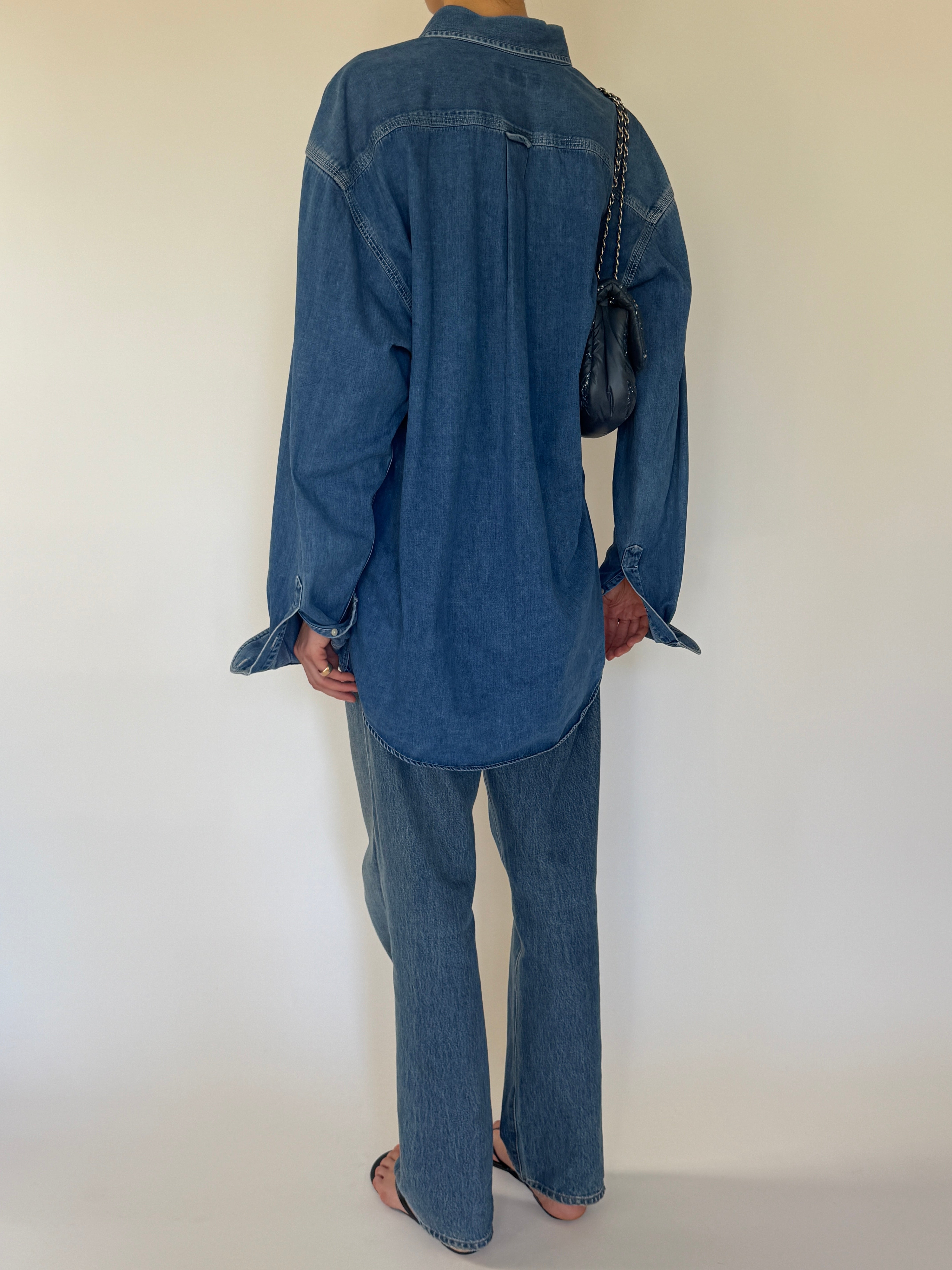 Vintage blue denim shirt back view