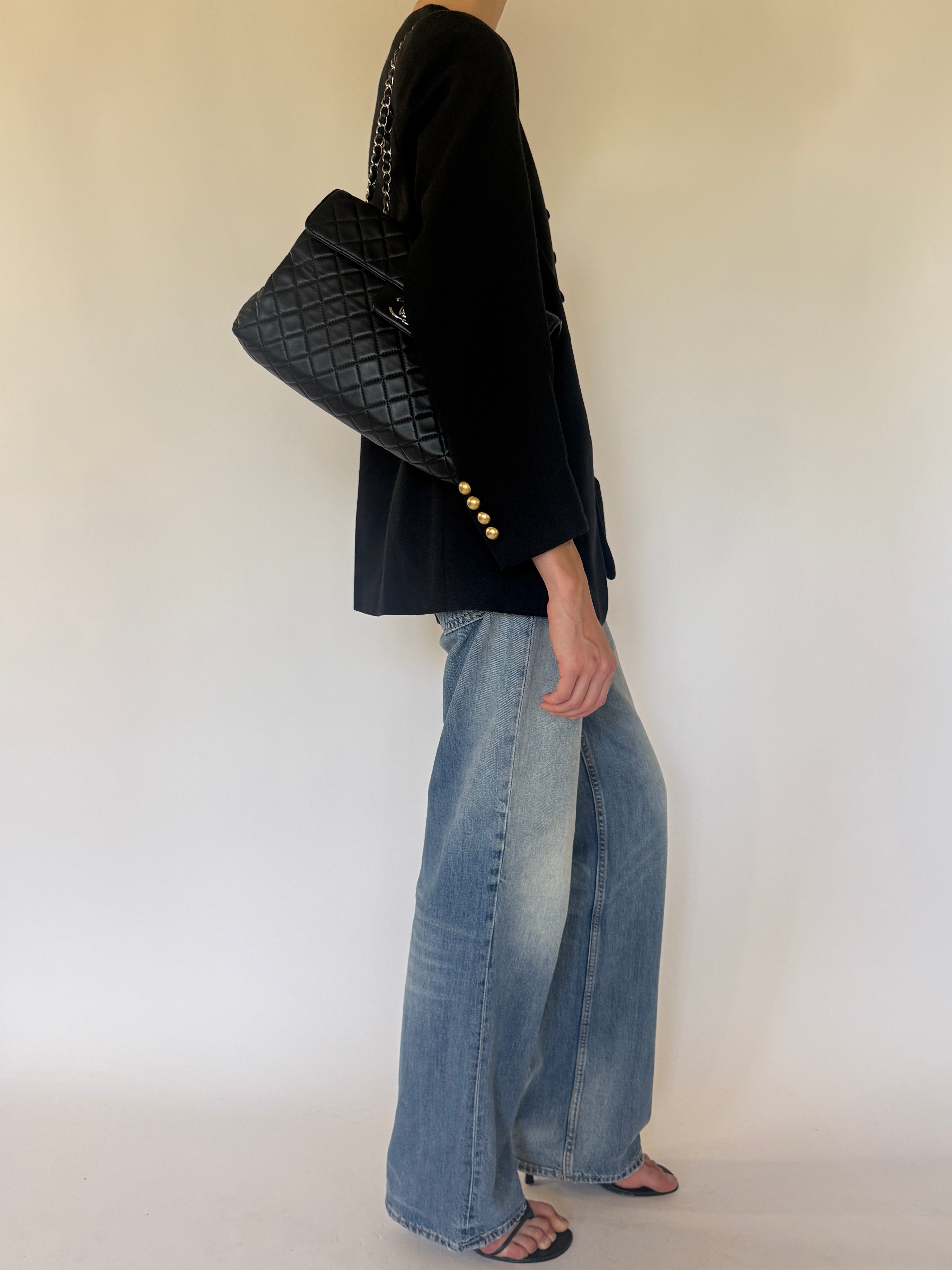 Vintage Adolfo black gold button blazer side view.