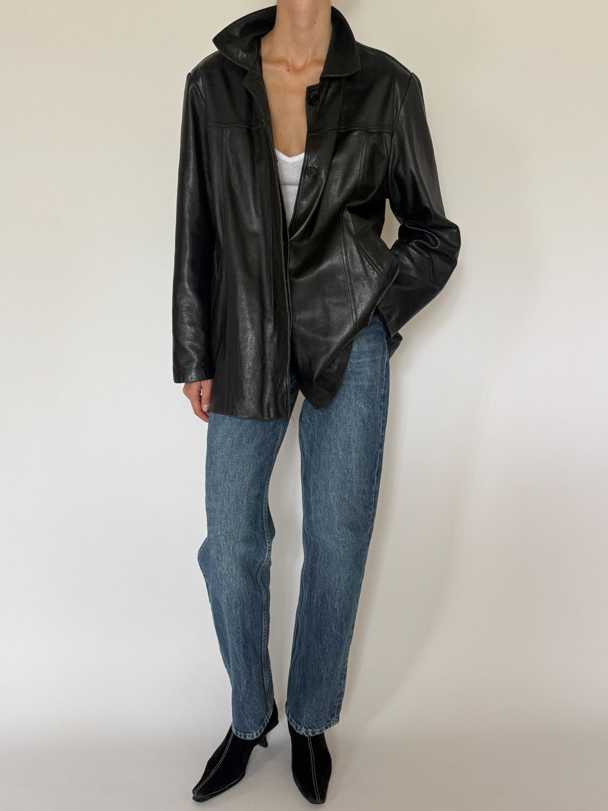 Vintage black leather jacket full front view