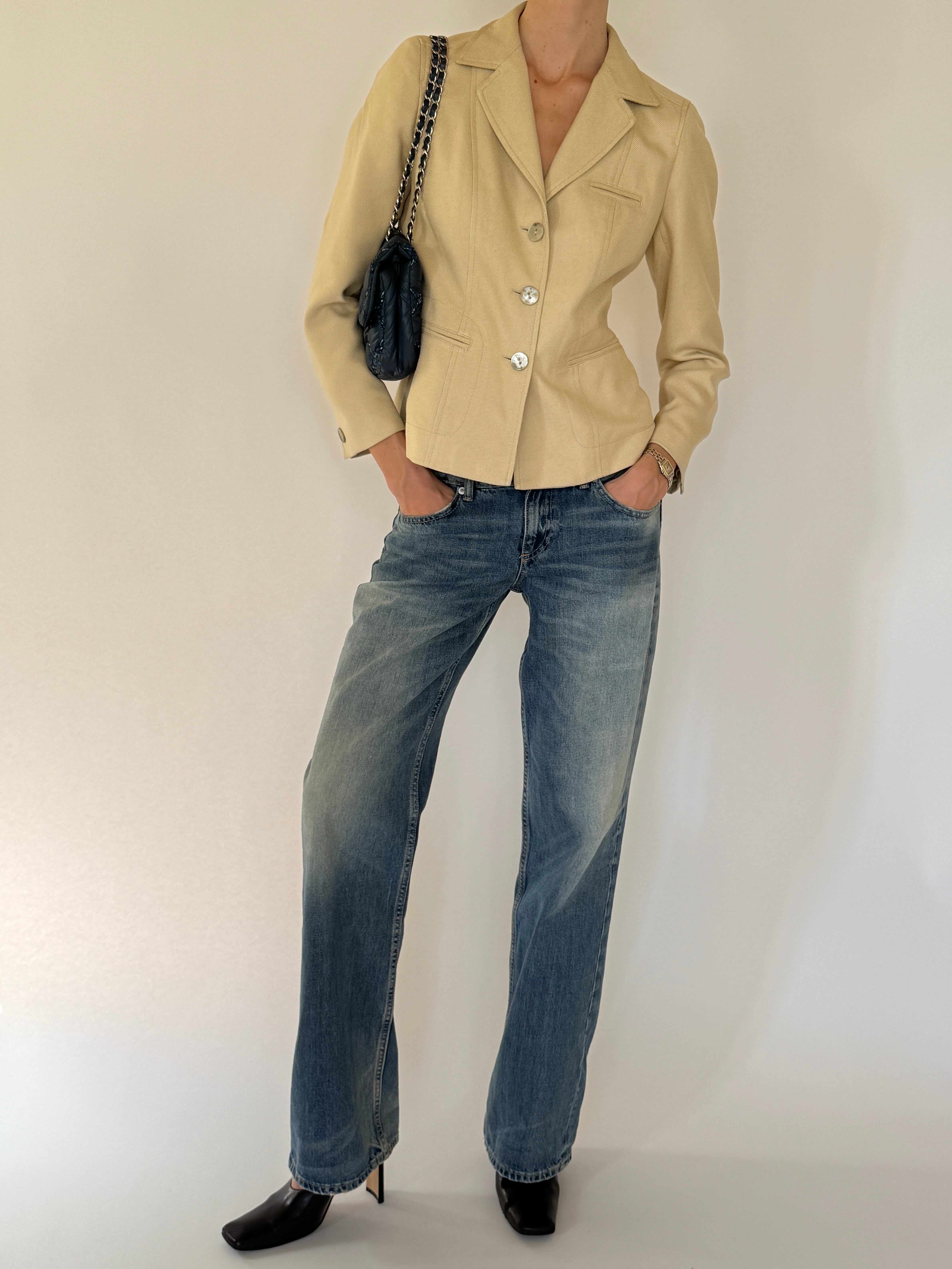 Vintage tailored beige blazer styled casually