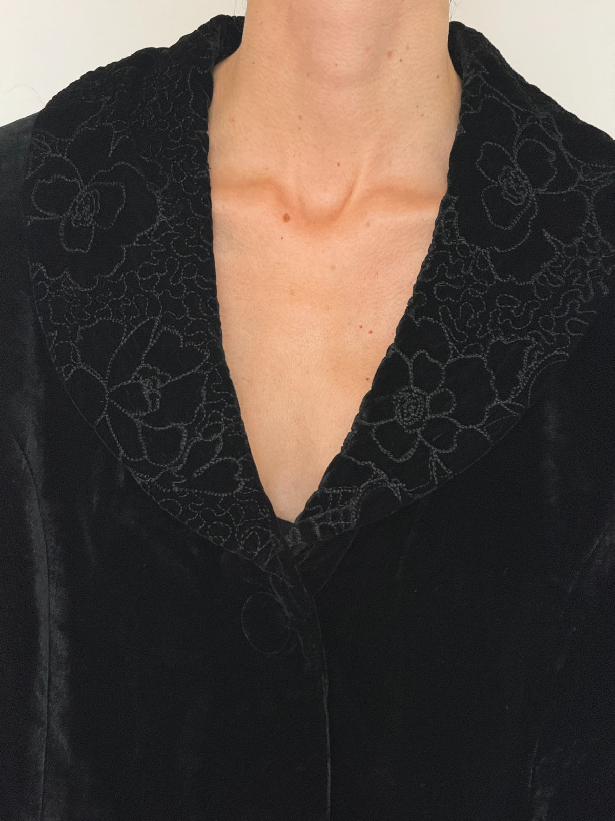 Vintage black velvet blazer floral collar close-up