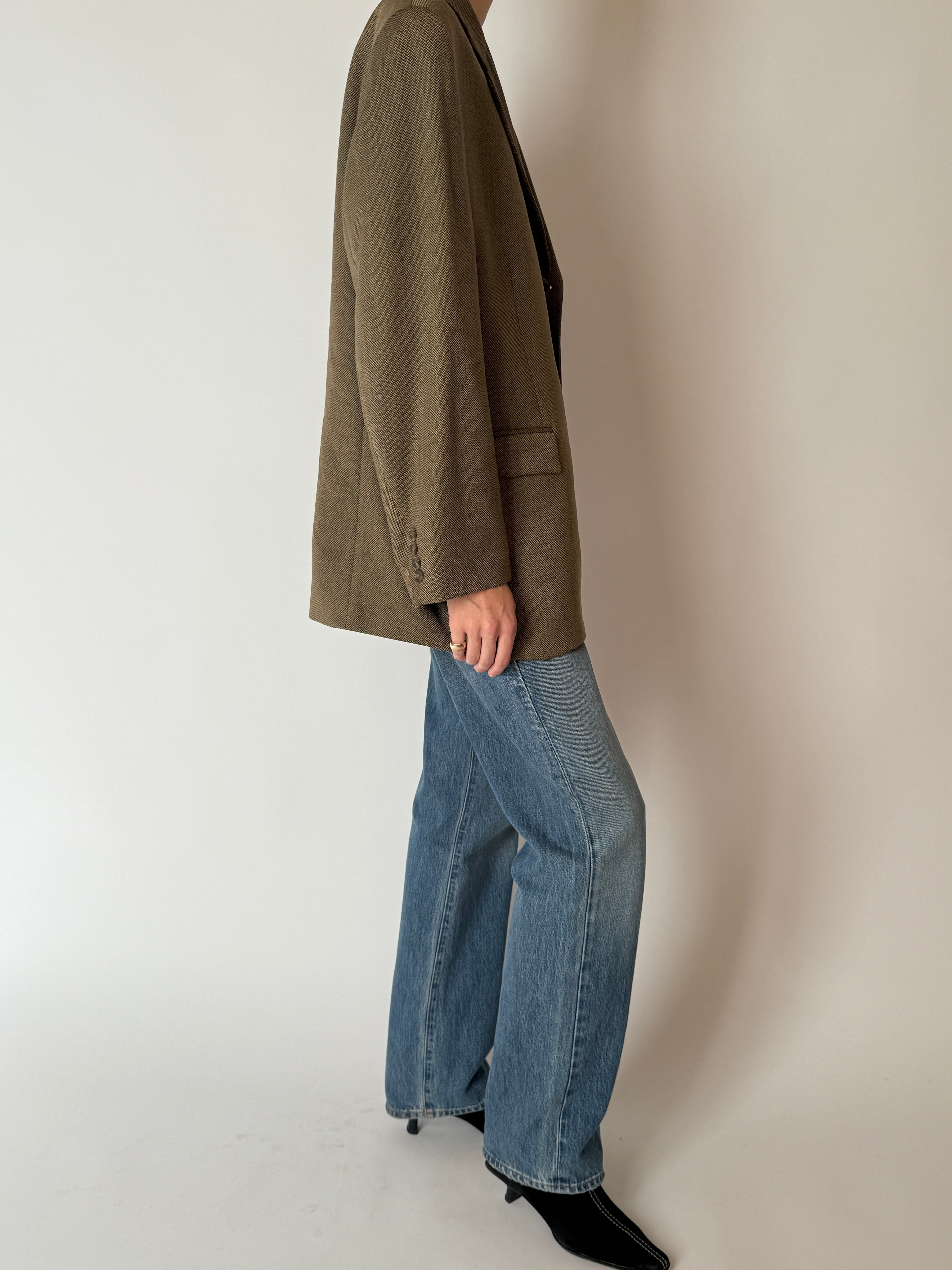 Side view of olive brown vintage blazer