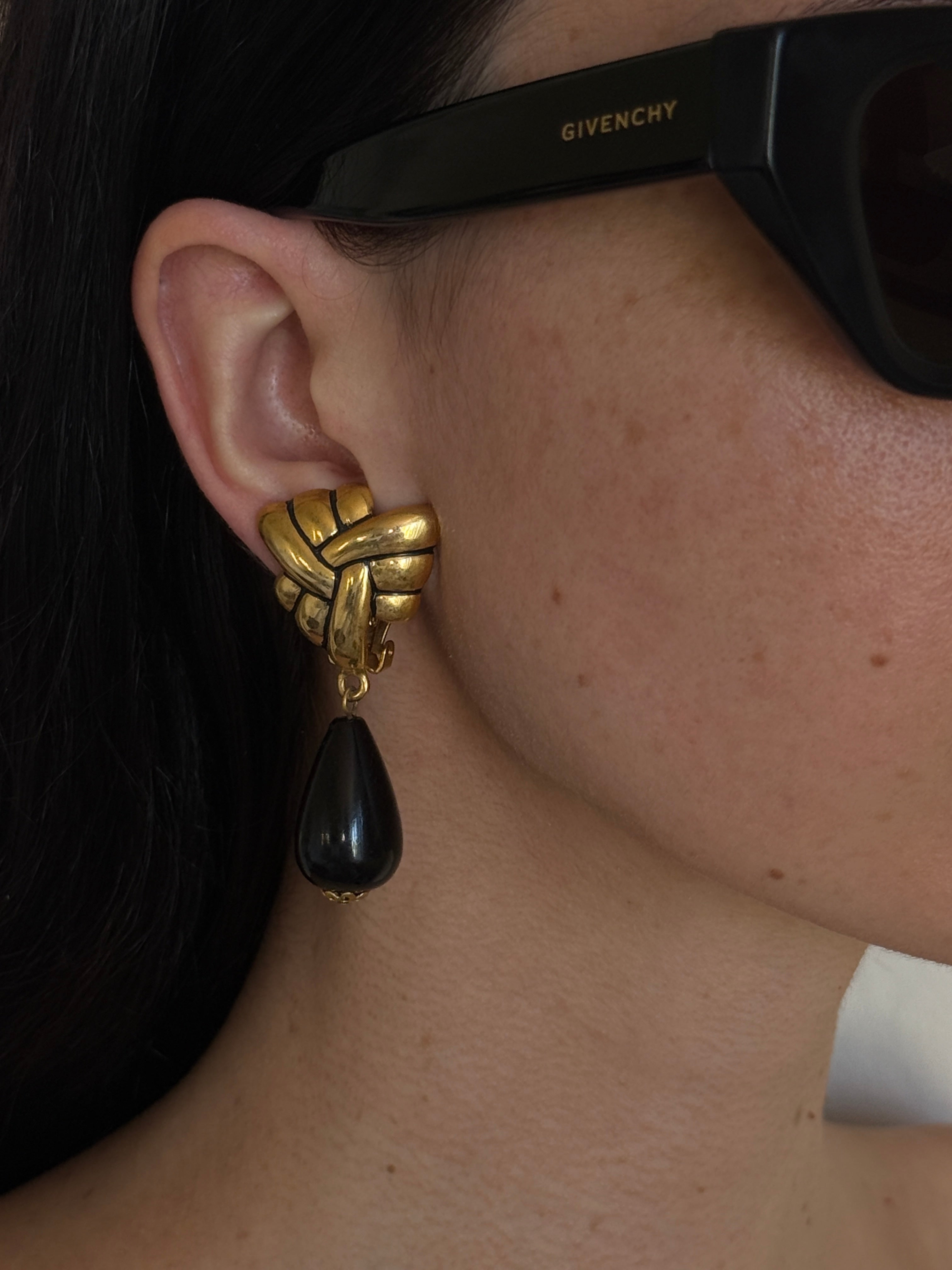 Vintage gold and black clip-on drop earrings front view