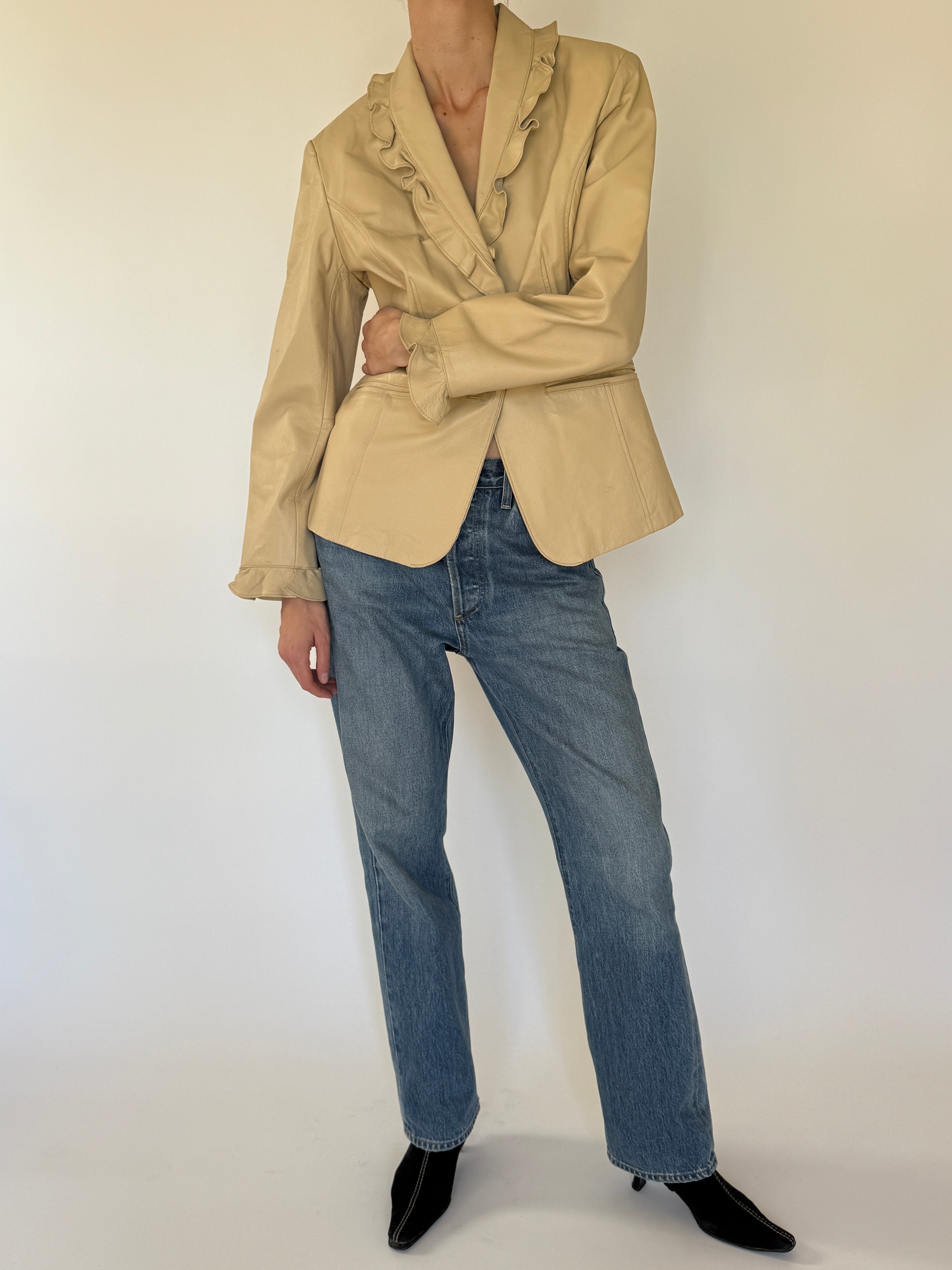 Vintage beige leather ruffle trim jacket front view