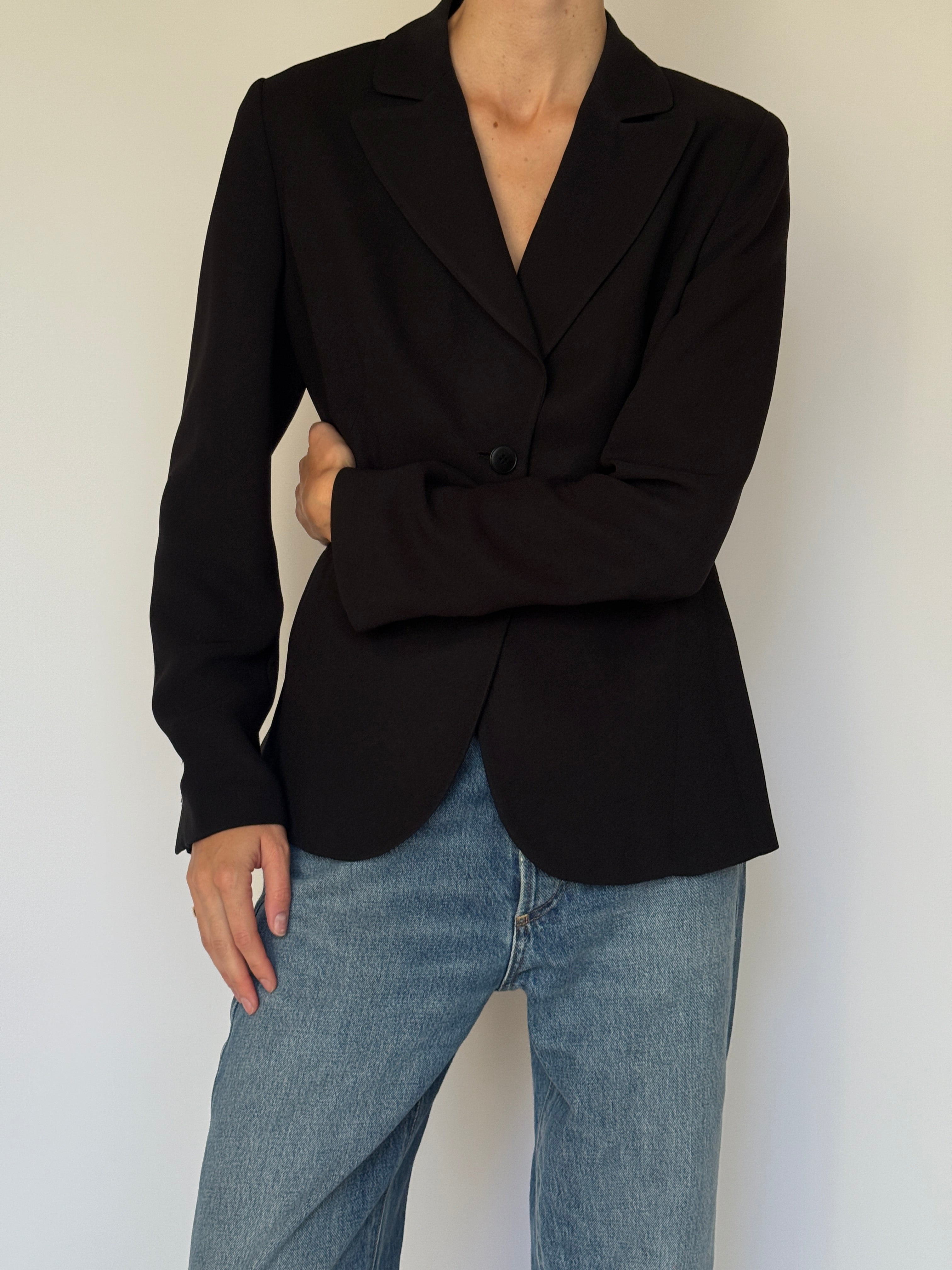 Vintage black tailored blazer styled with denim