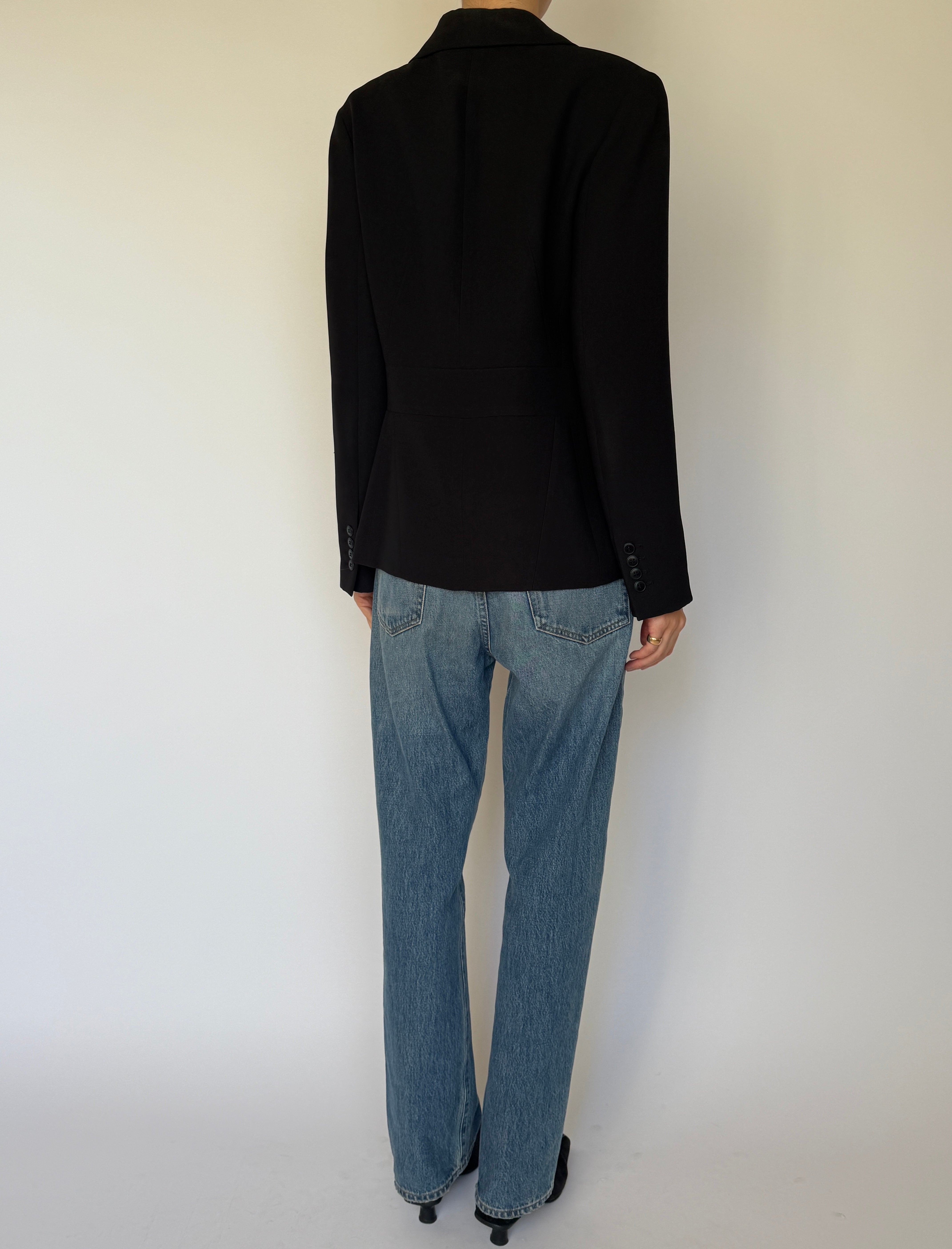 Back view of tailored vintage black blazer