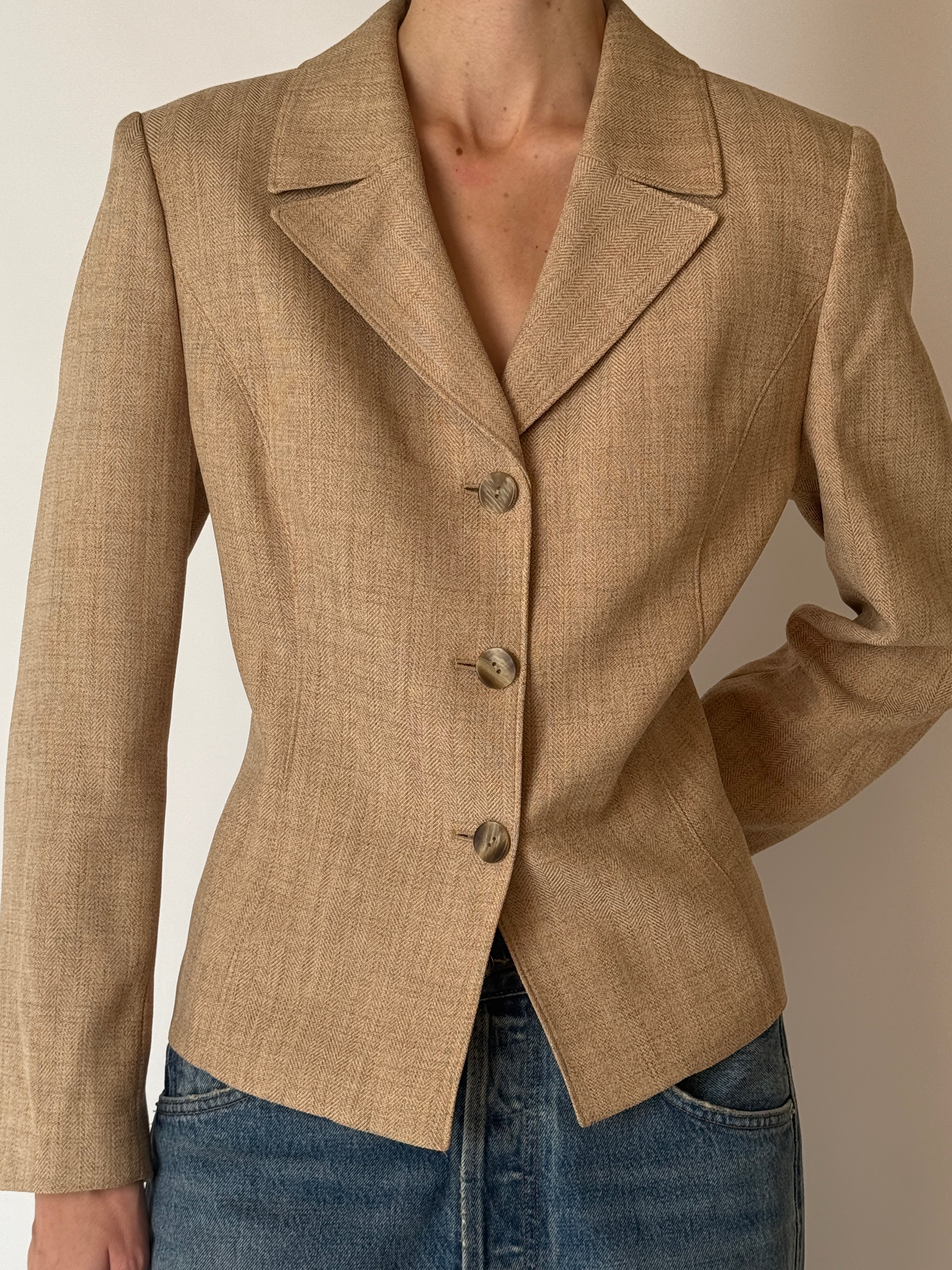 Back view of vintage tan herringbone blazer