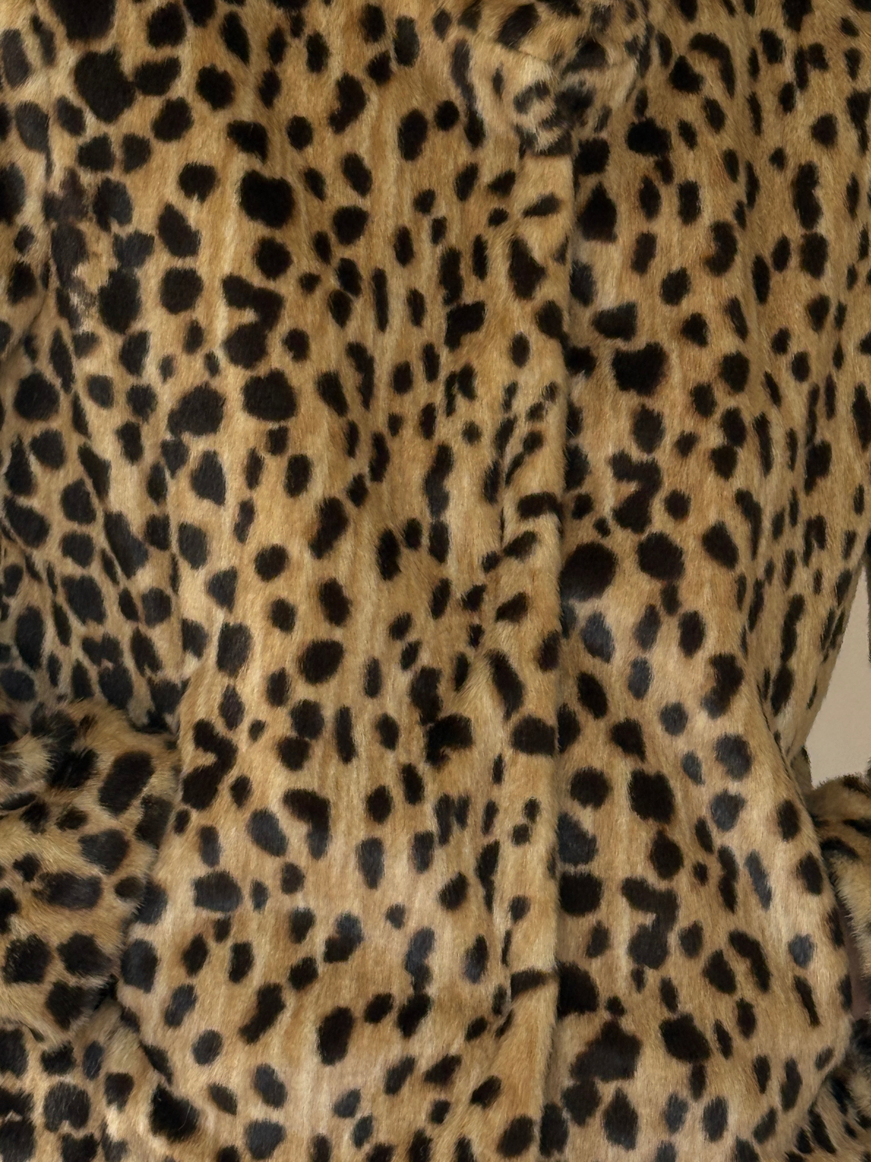 Vintage faux fur jacket leopard fabric close-up